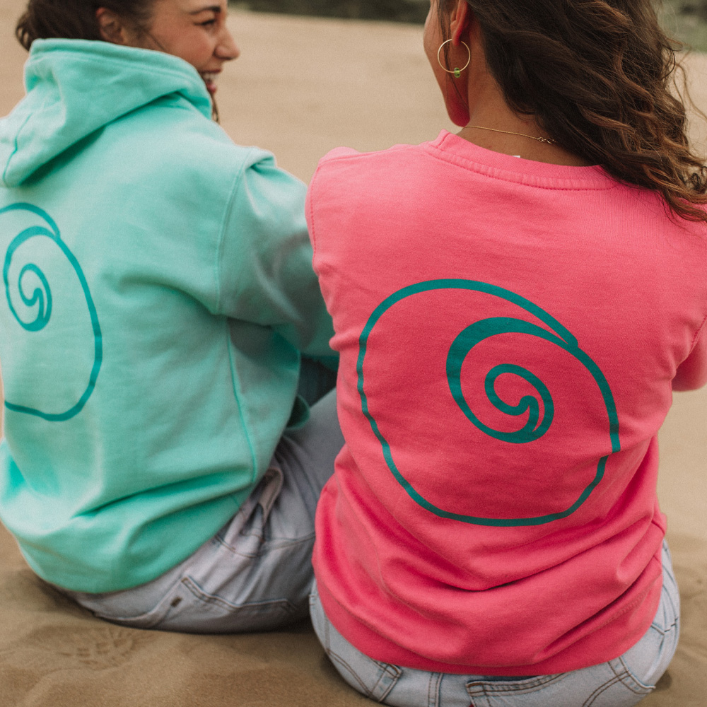 Nalu sweatshirts and hoodies in mint and pink.
