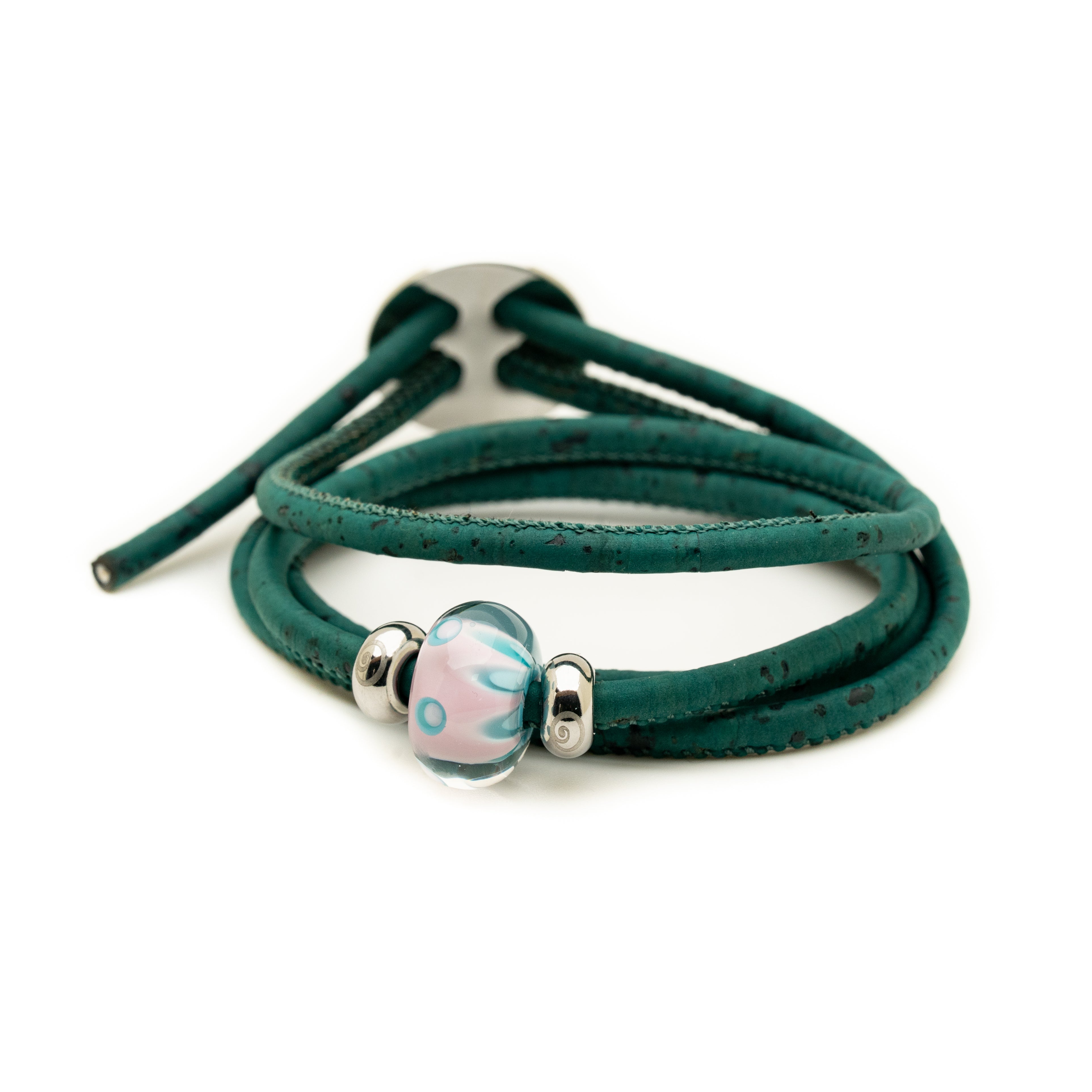 Pink glass bead on sea green cork bracelet.