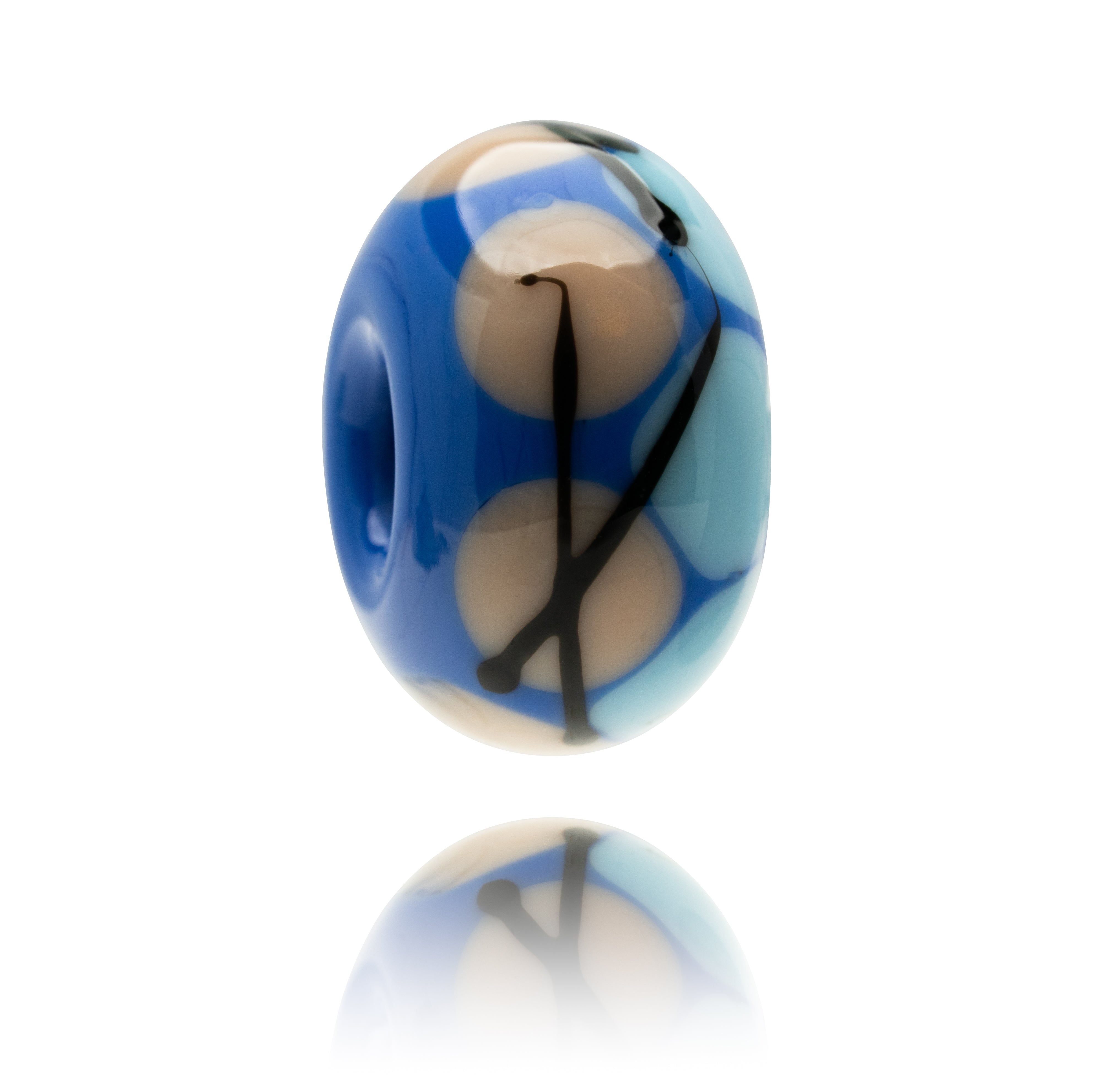 Multicolored glass bead on a white background