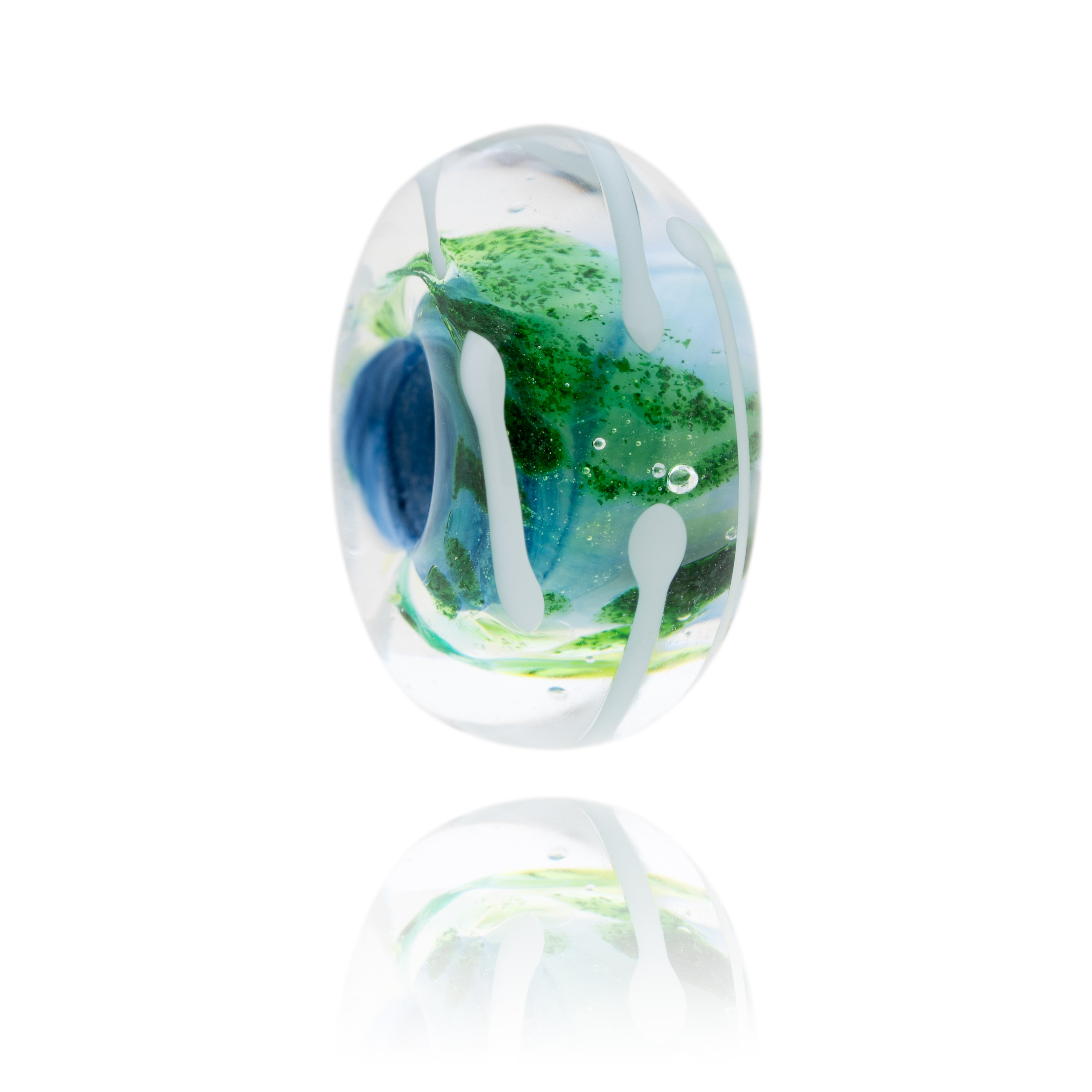 Blue, green and clear glass bead with white surface patterns representing Blue Anchor Bay in Somerset.