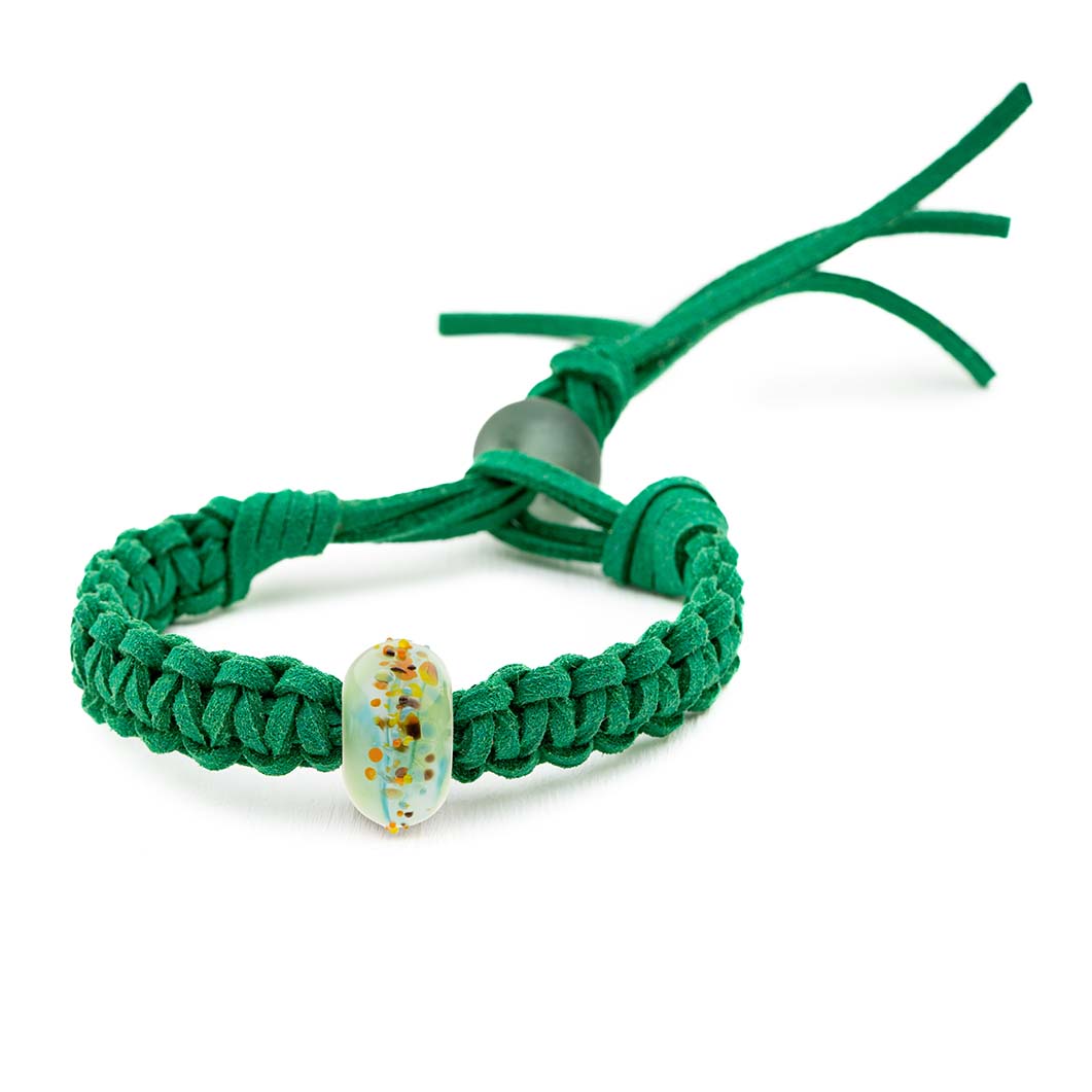 Green and blue glass bead bracelet with orange, yellow and brown speckles on the surface. Being sold in support of the Braunton Countryside Centre.