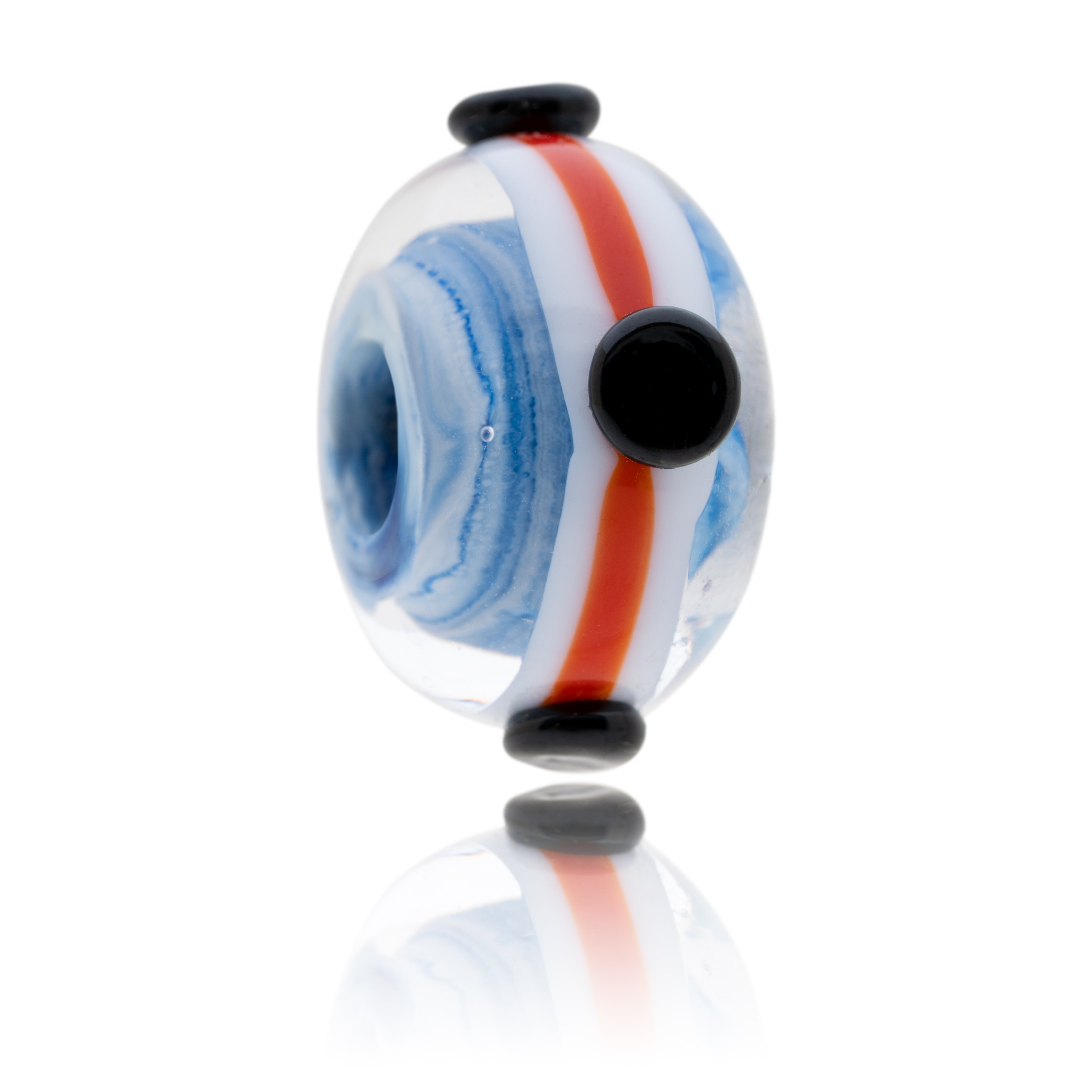 Blue, white, clear glass bead with a white and red surface stripe pattern with four black dots. Representing Burham-On-Sea.