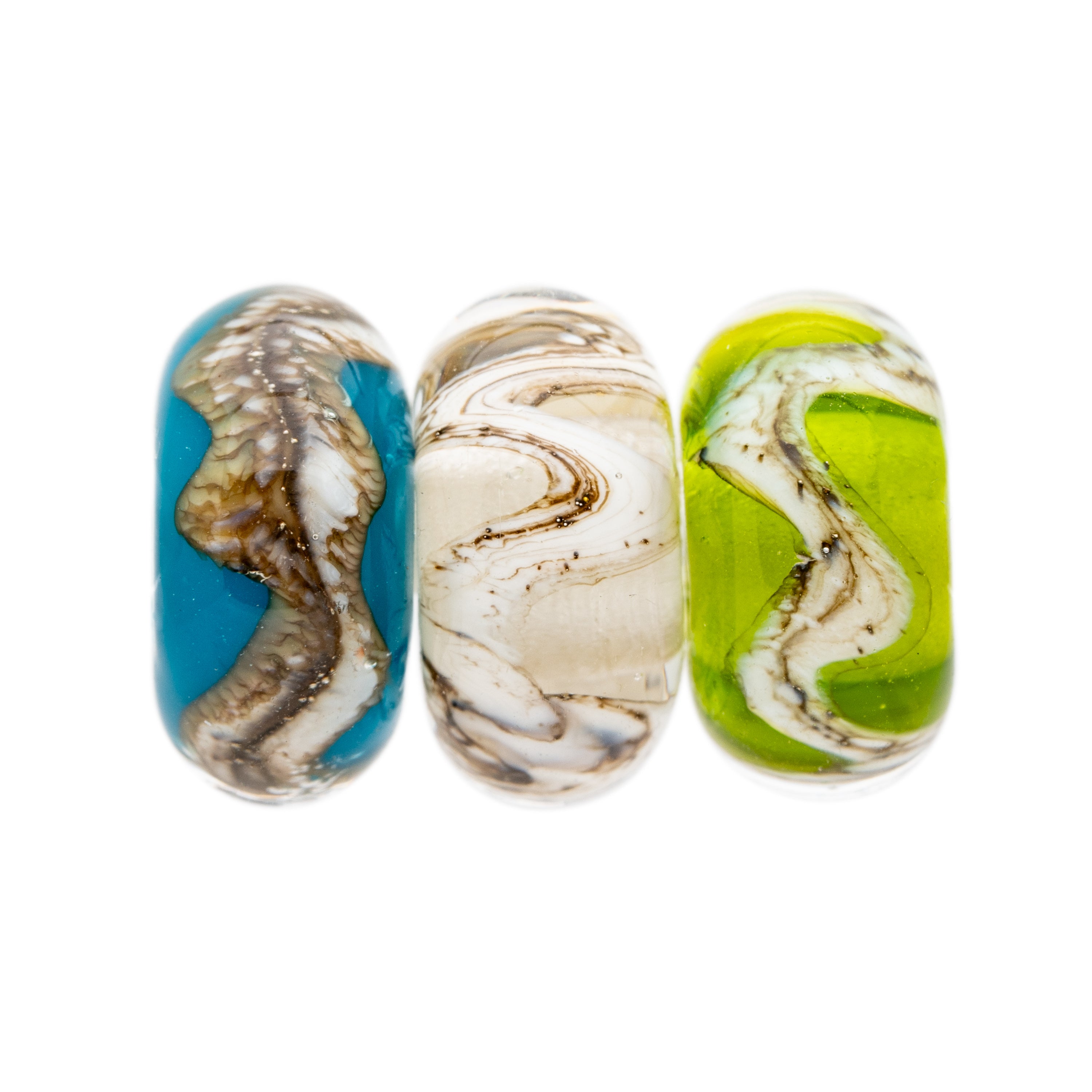 Dark turquoise, clear and bright green glass beads wrapped with swirling silver sand pattern, representing the Devon coastline.