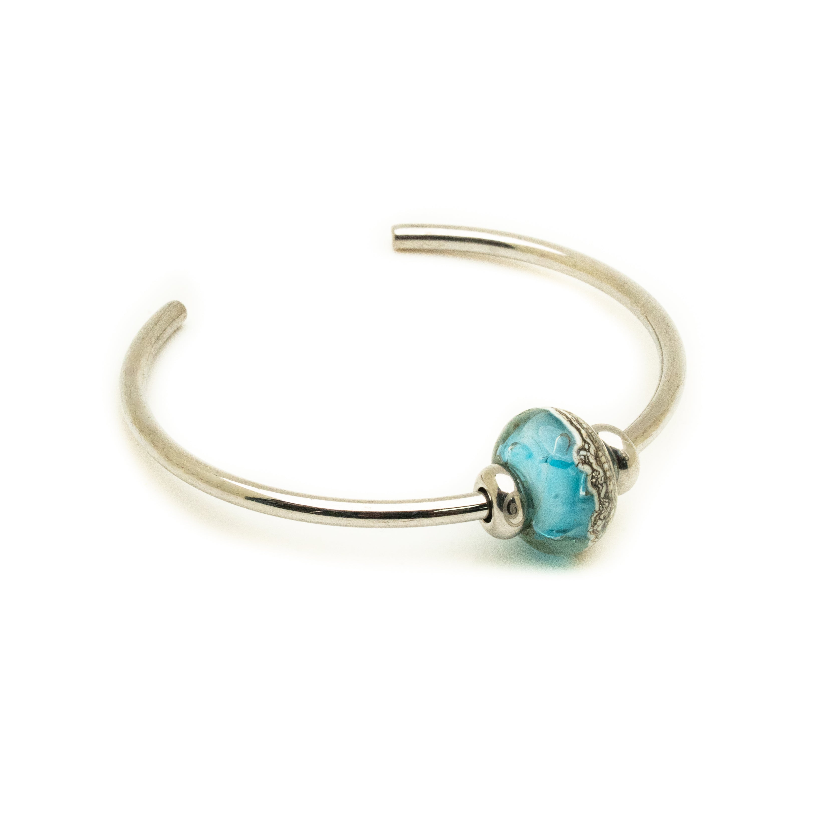 Silver bracelet with a turquoise bead on a white background