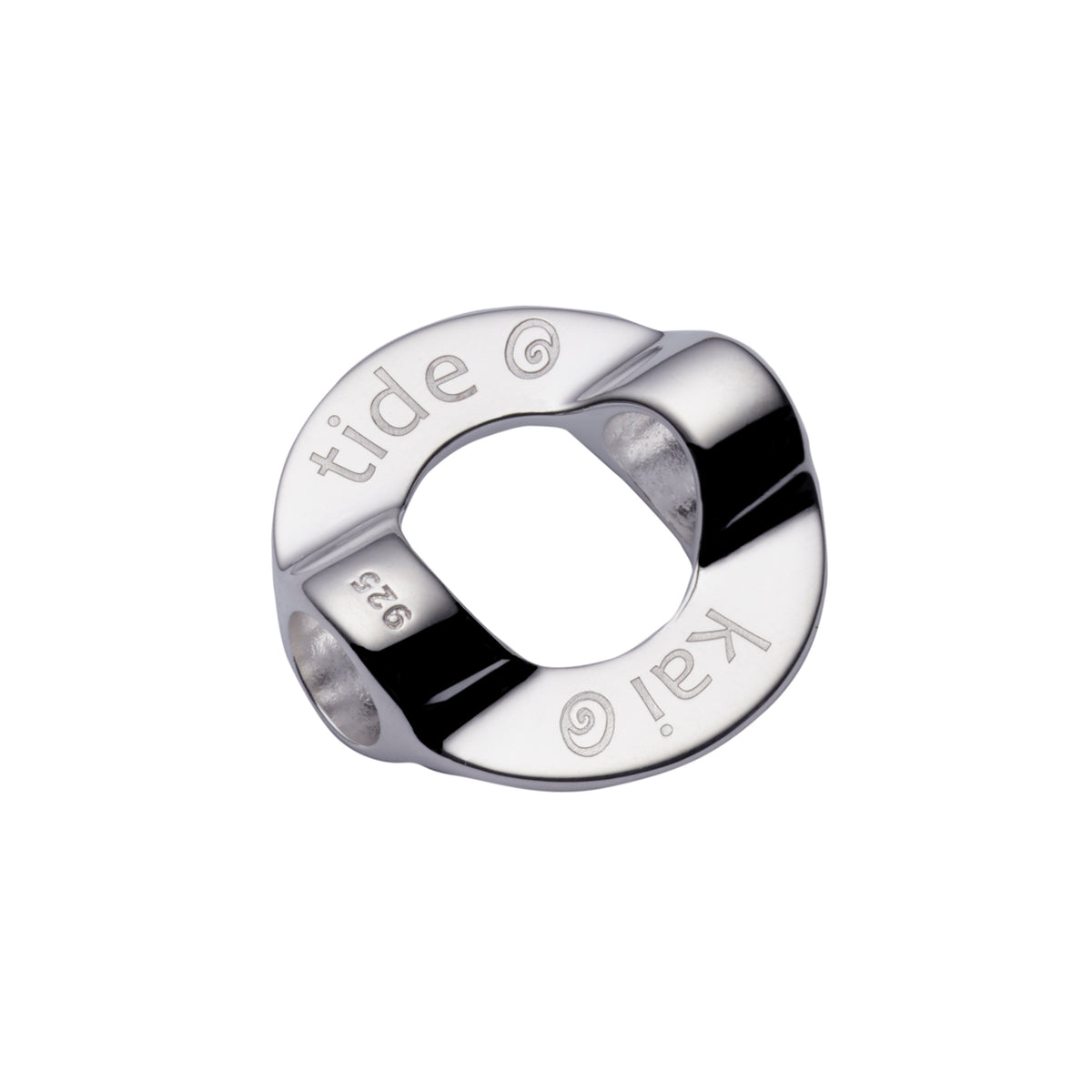A polished silver metal ring-shaped charm with engraved text reading 'tide @ kai' on a plain white background.