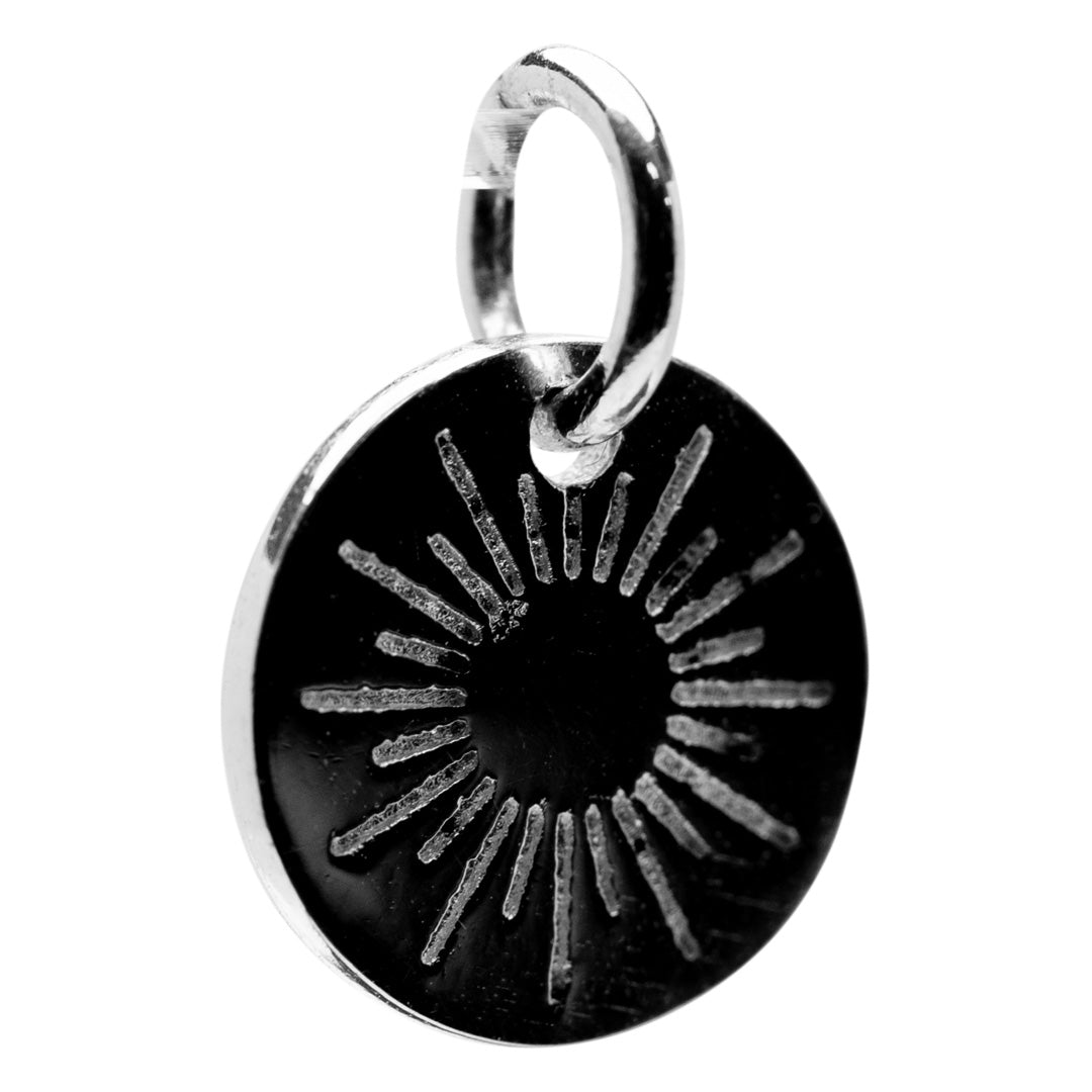 Makai Silver Sunburst Charm