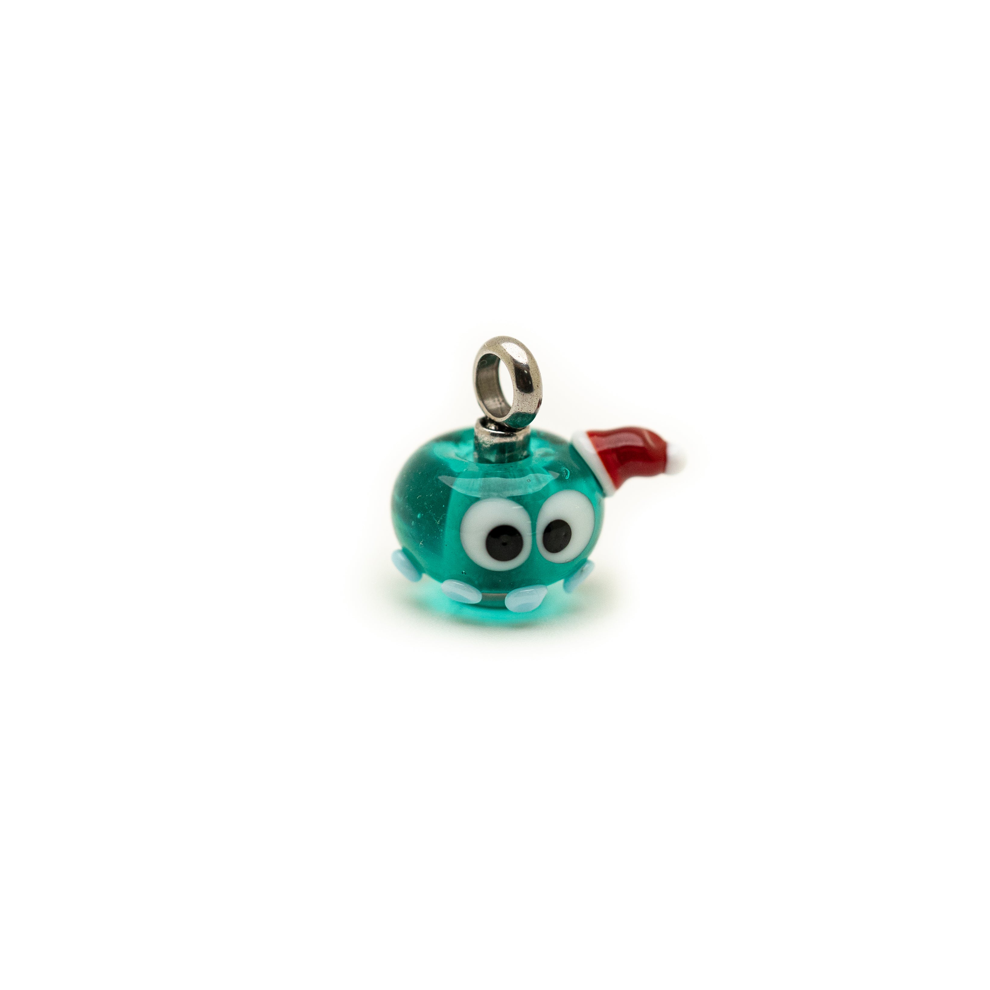 Teal glass charm bead shaped like an octopus wearing a Christmas hat.
