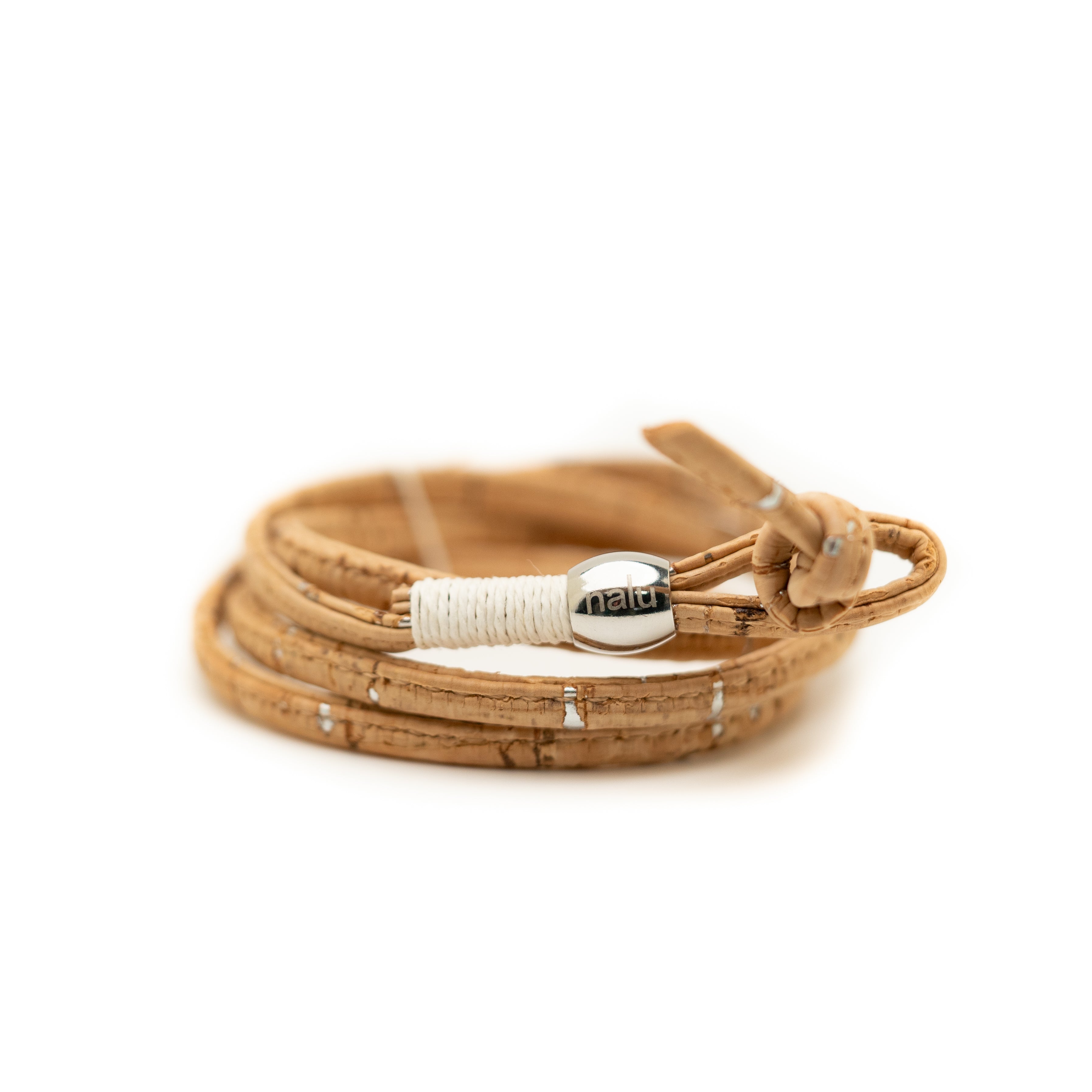 Brown leather bracelet with a metal clasp on a white background
