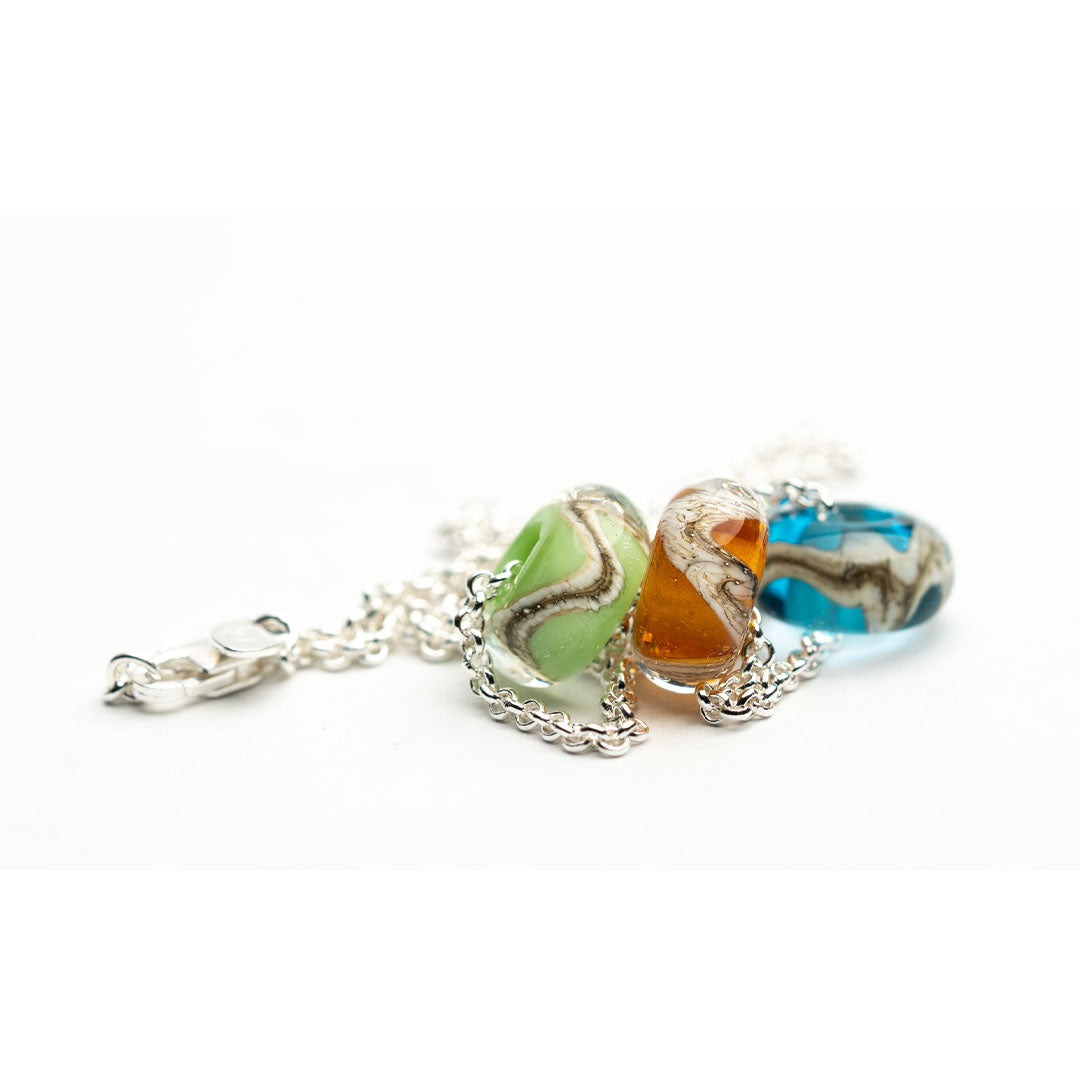Green, blue and amber glass beads for Norfolk on silver chain necklace.