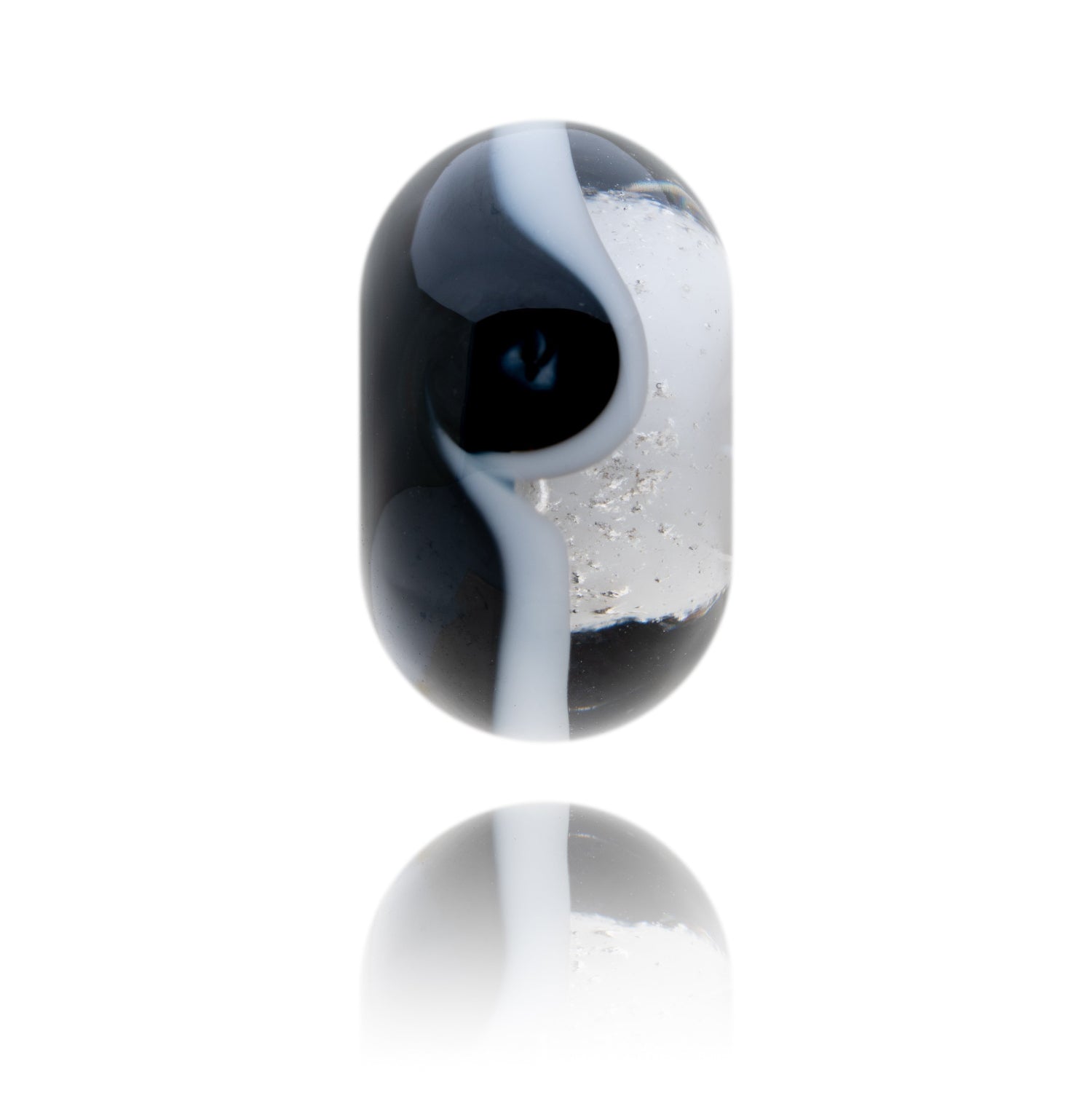 Black and clear glass bead representing the county of Northumberland.