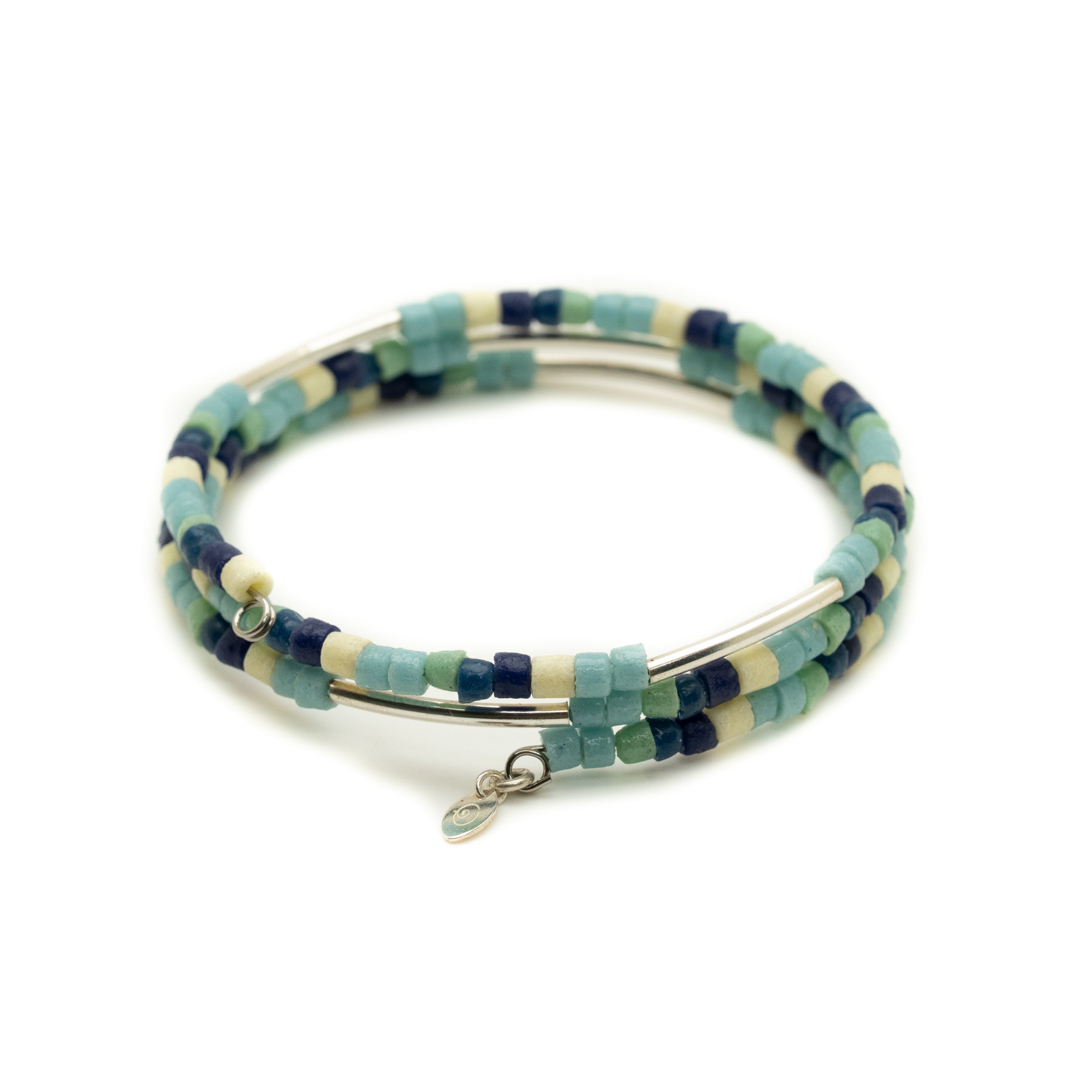 Beaded bracelet with blue and green hues on a white background