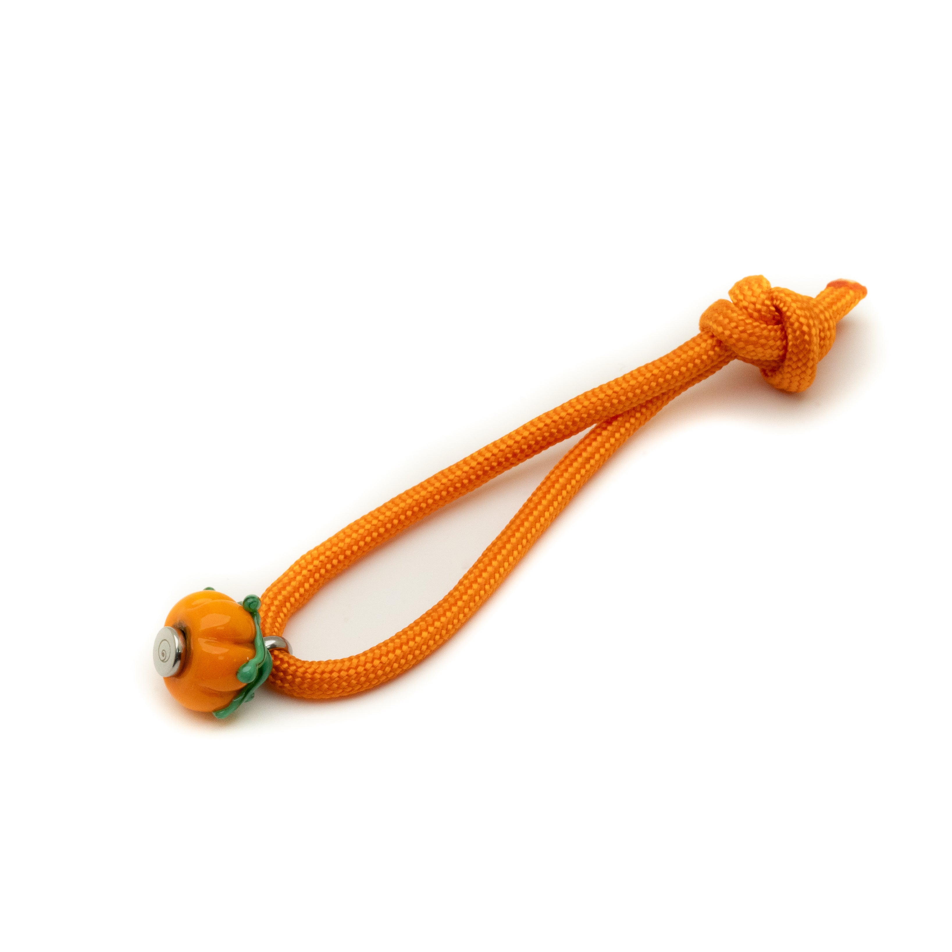 Orange cord with a knot and pumpkin-shaped bead end on a white background