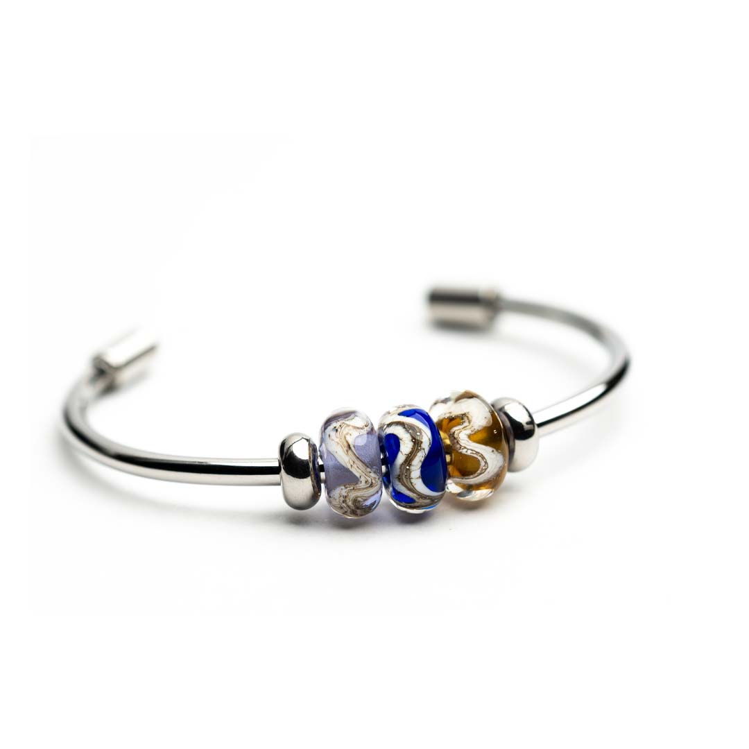 Scottish beads on silver steel bangle.