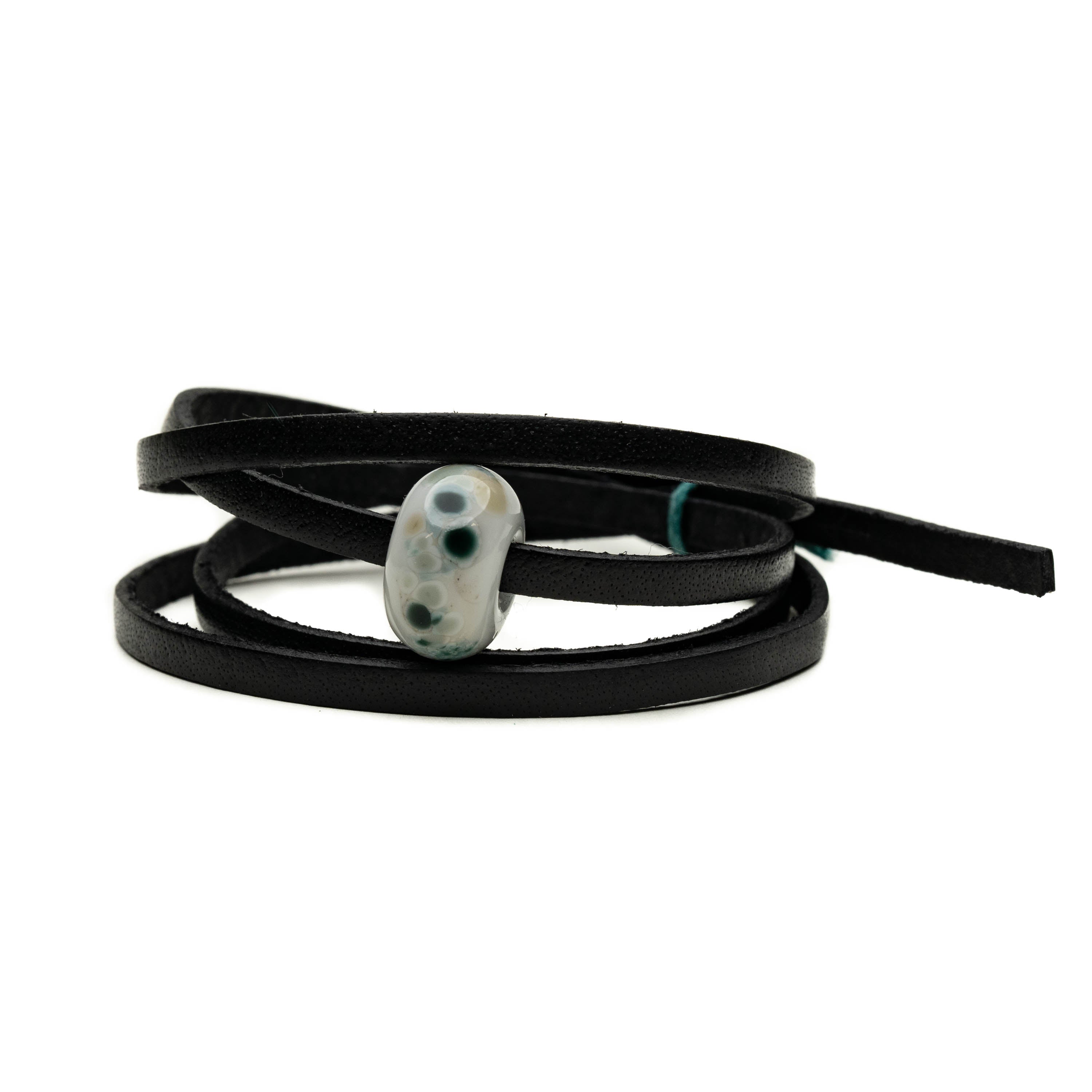 Seal sanctuary charity bead on black leather wrap.