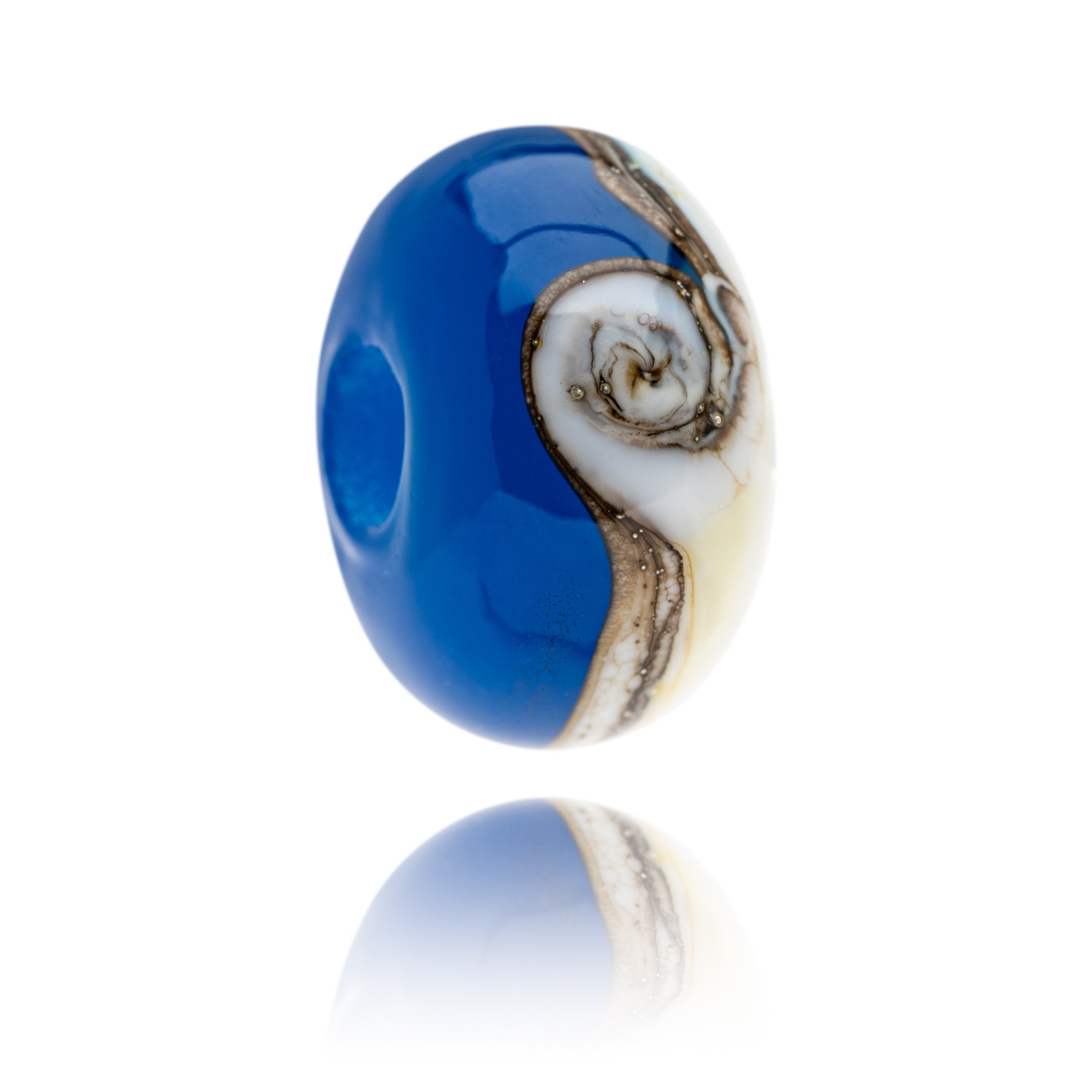 Bright blue and white glass bead