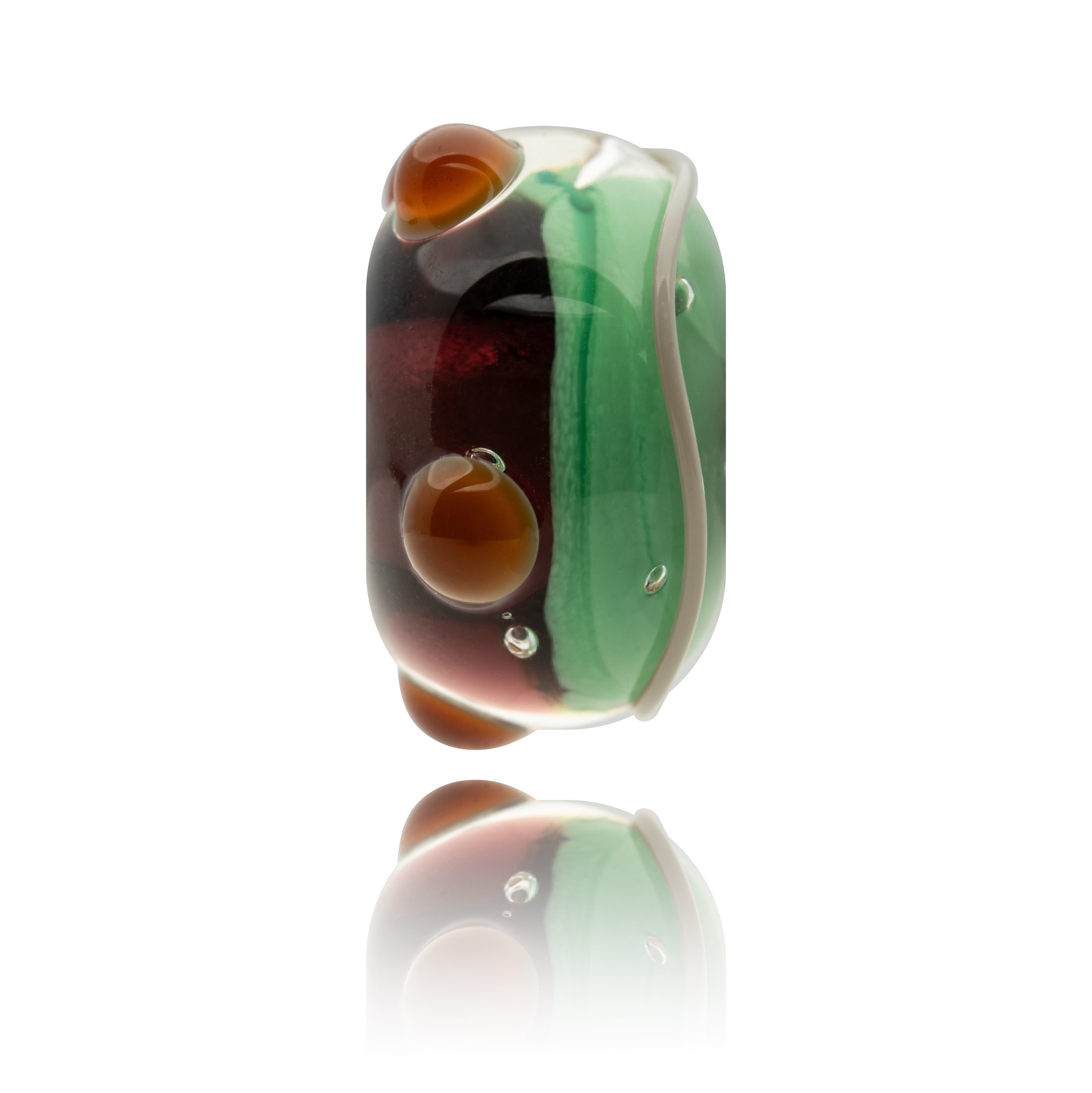 Multicolored glass bead on a white background