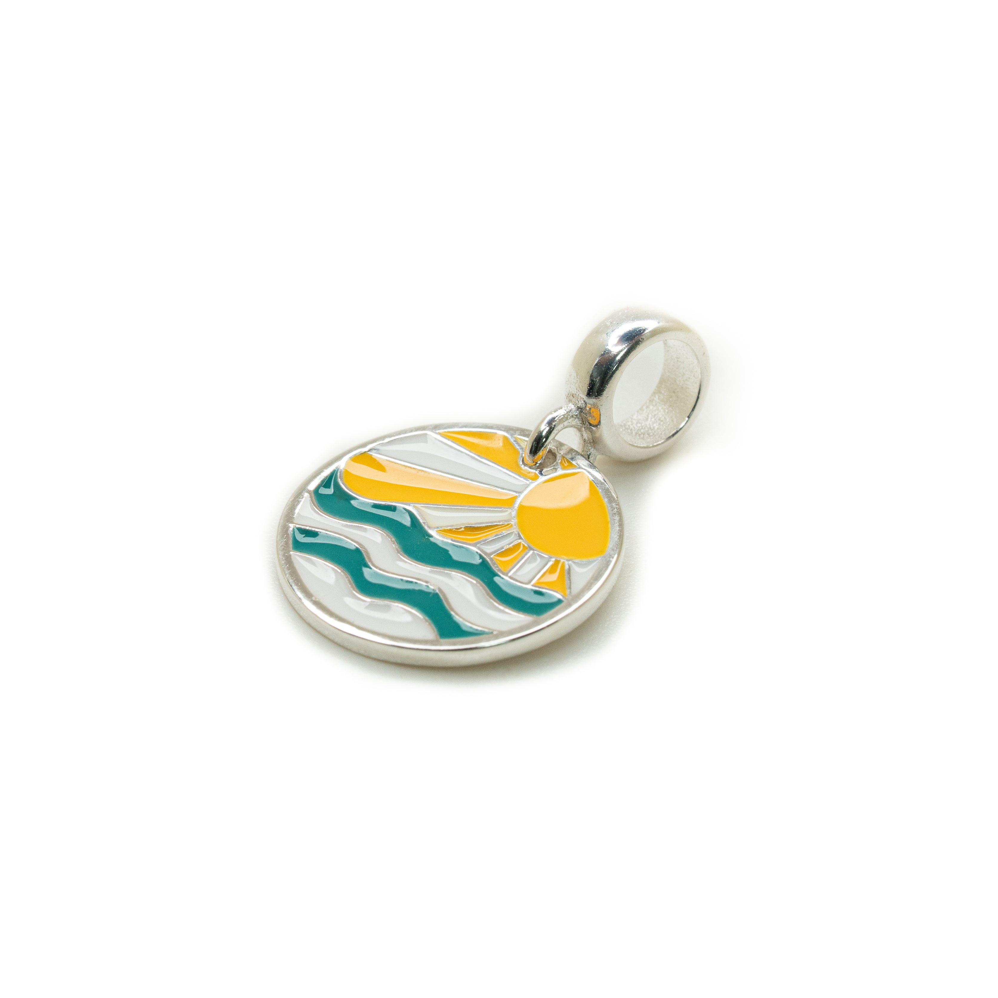 A silver oval charm pendant featuring an enamel design of a yellow sun, white rays, and teal waves, shown on a plain white background.