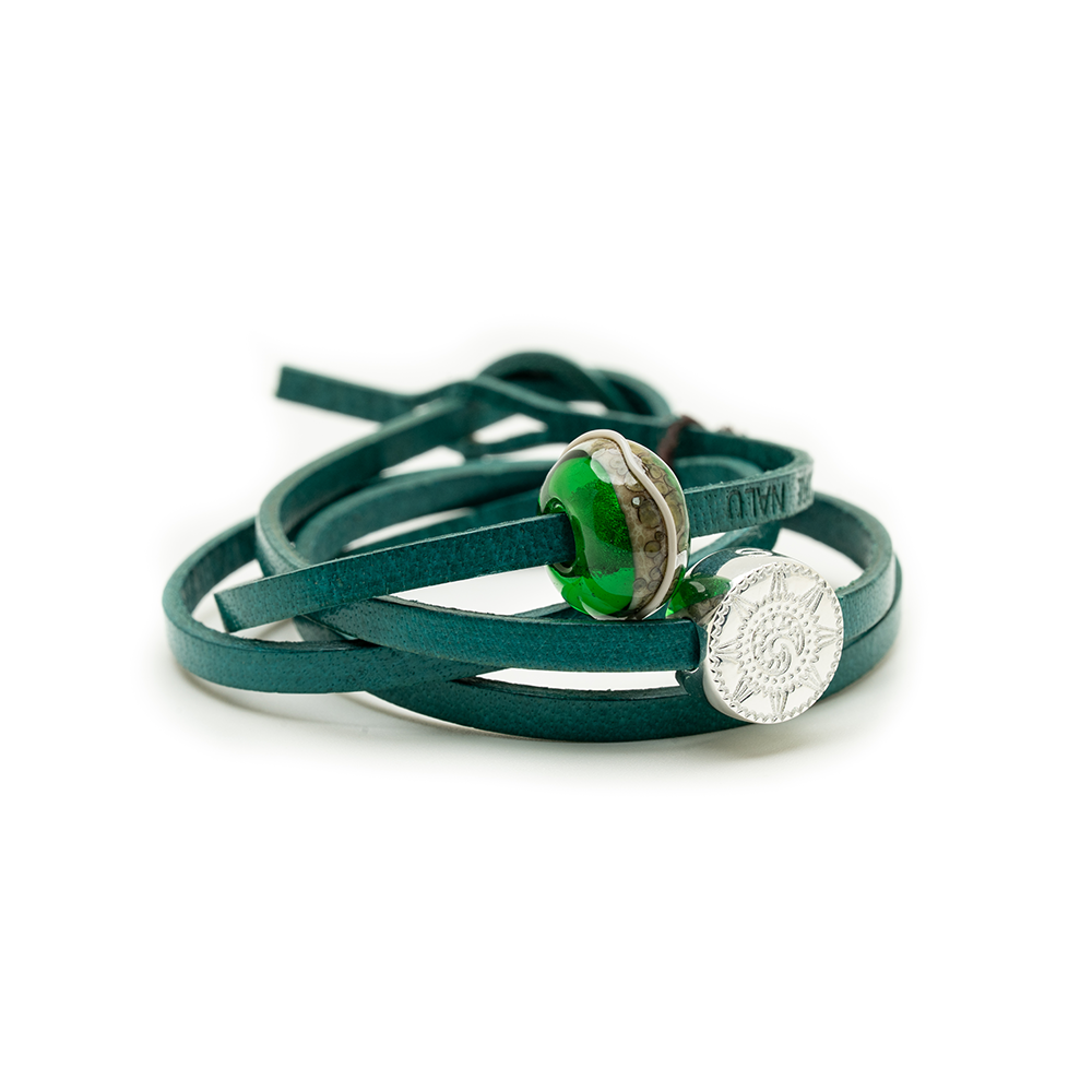 Green leather wrap bracelet with silver and green beads on a white background