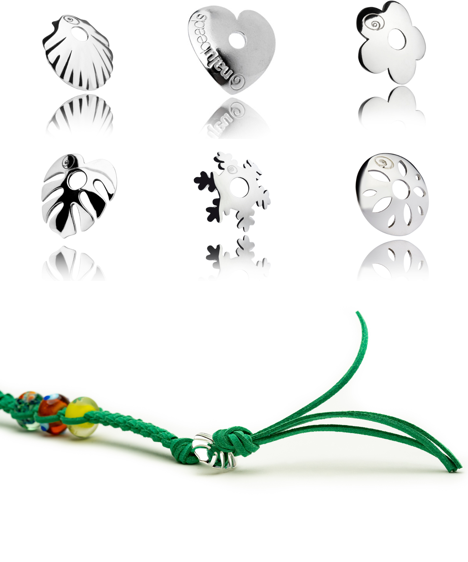 Collection of silver charms on a green string with a white background