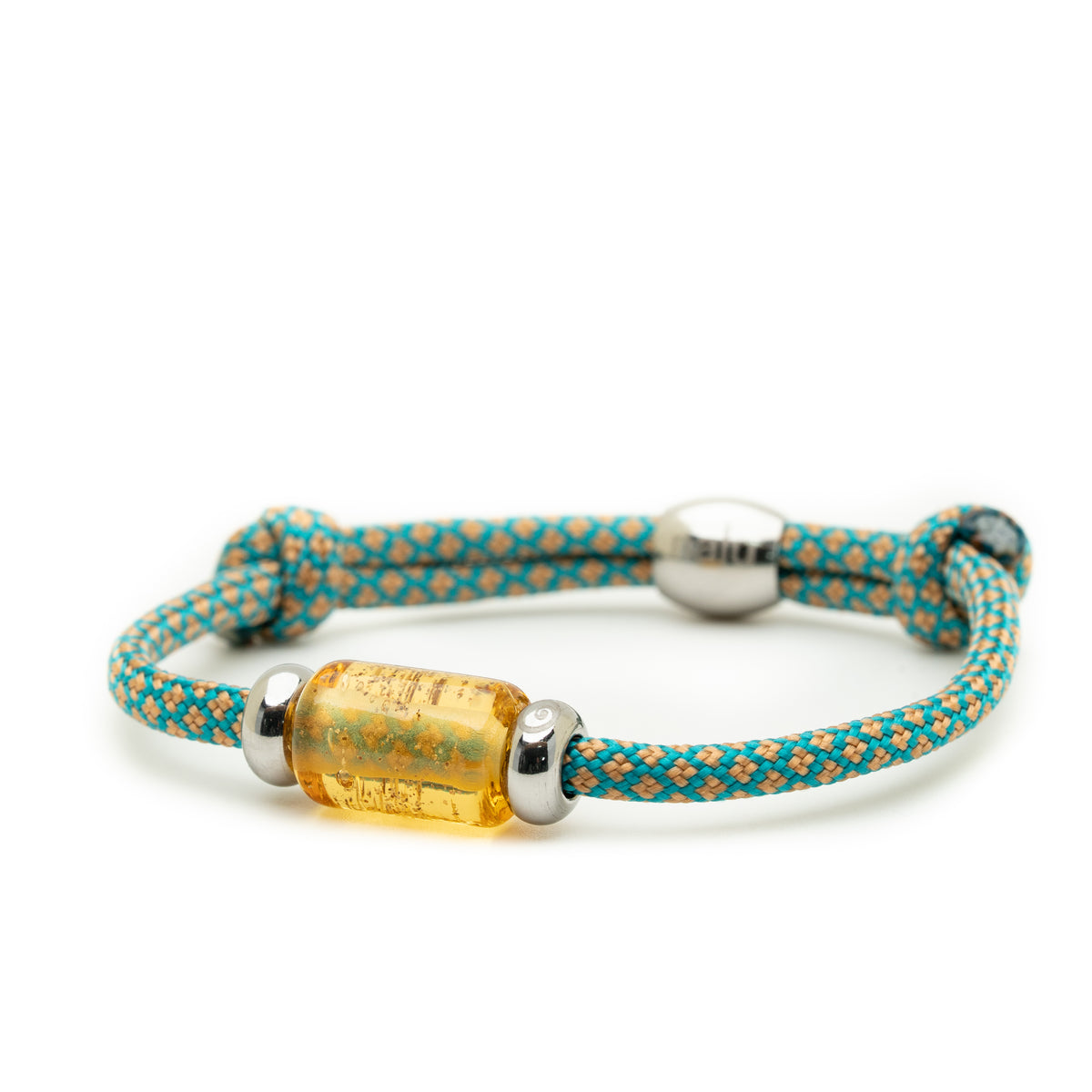 A braided cord bracelet in turquoise and orange with a central translucent amber cylindrical bead, finished with silver-toned metal caps, shown on a white background.