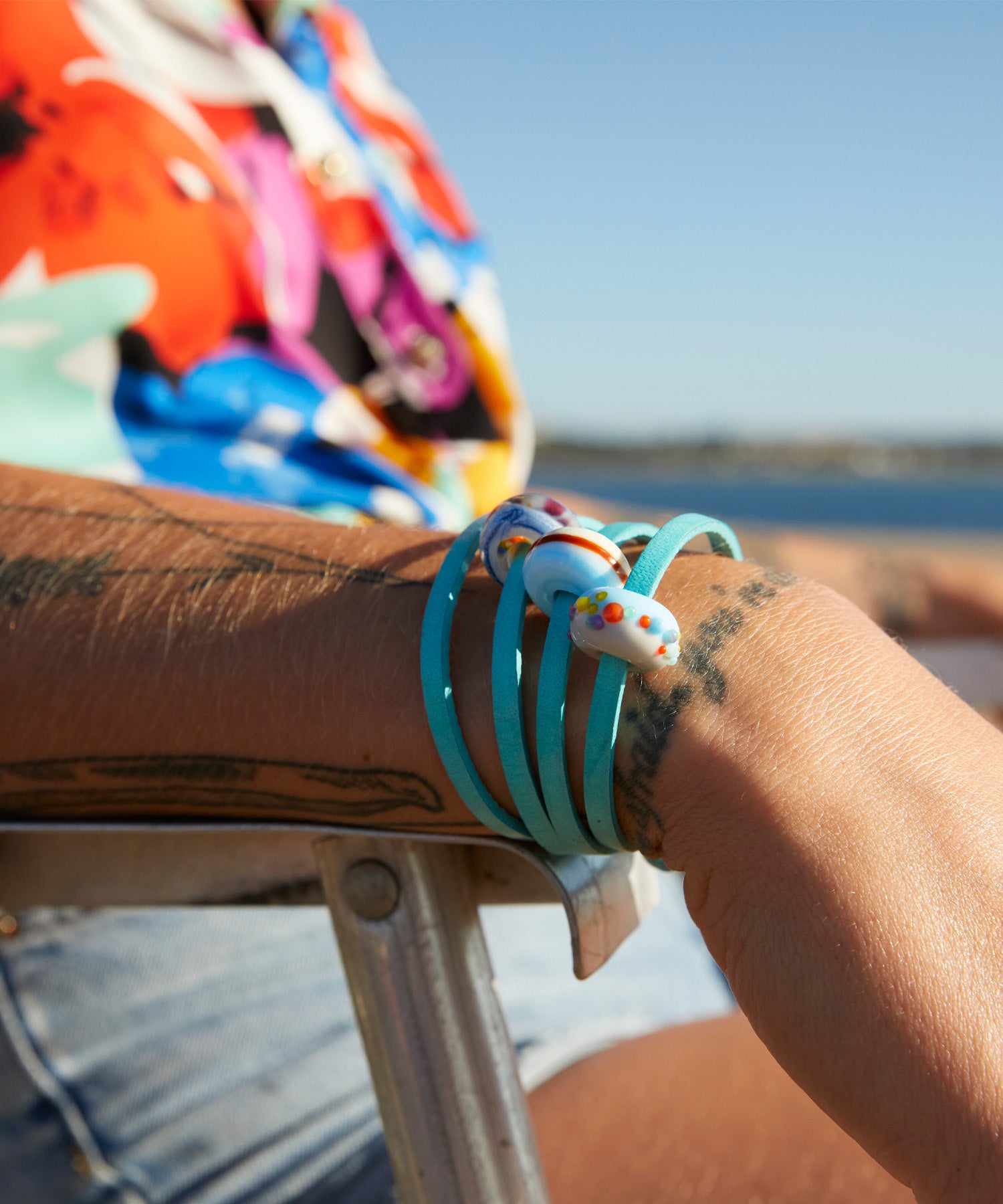 Colourful beads on turquoise leather wrap bracelet