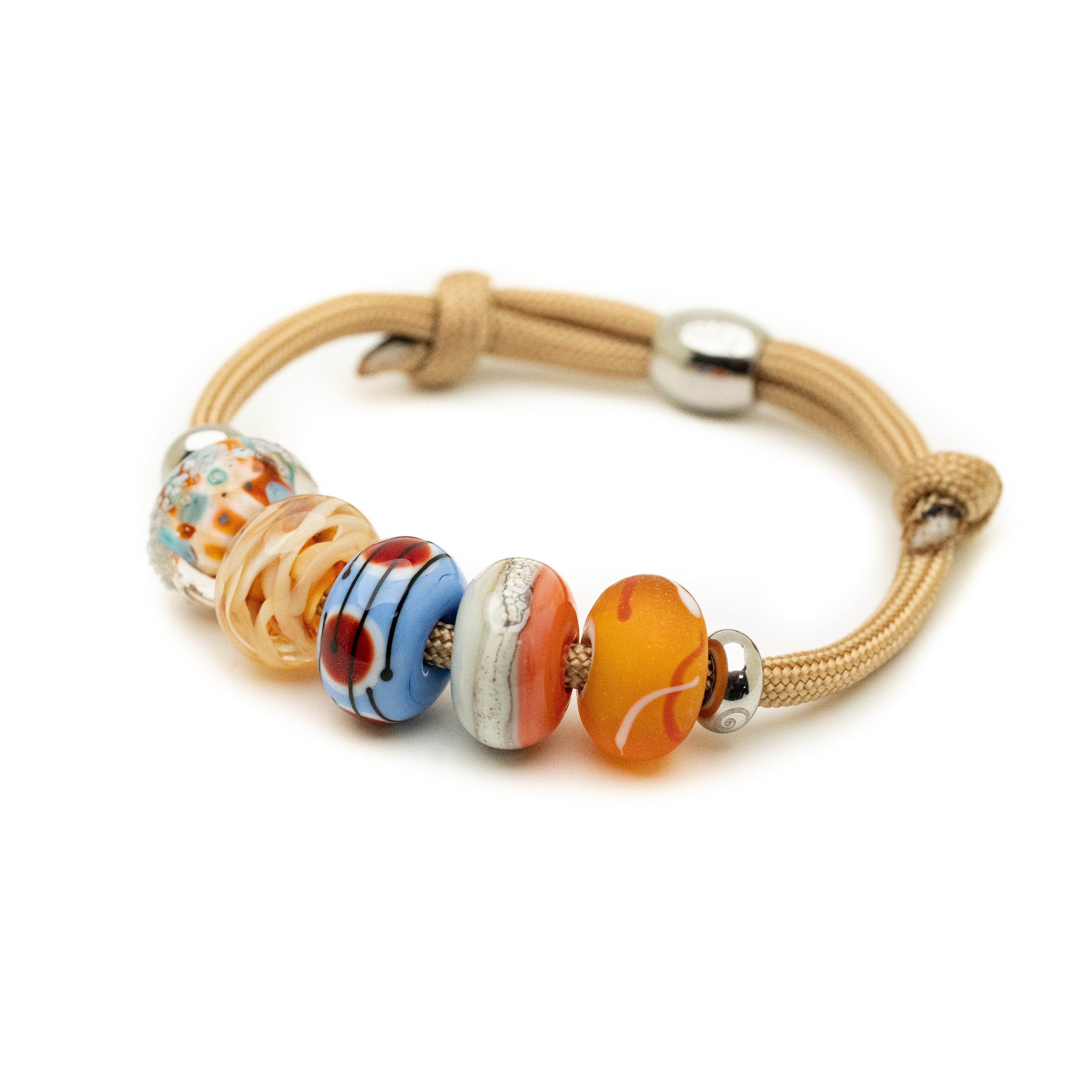 Colourful glass beads on sand cord.