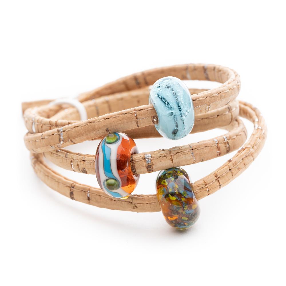 Natural cork wrap with brown and blue patterned glass beads.