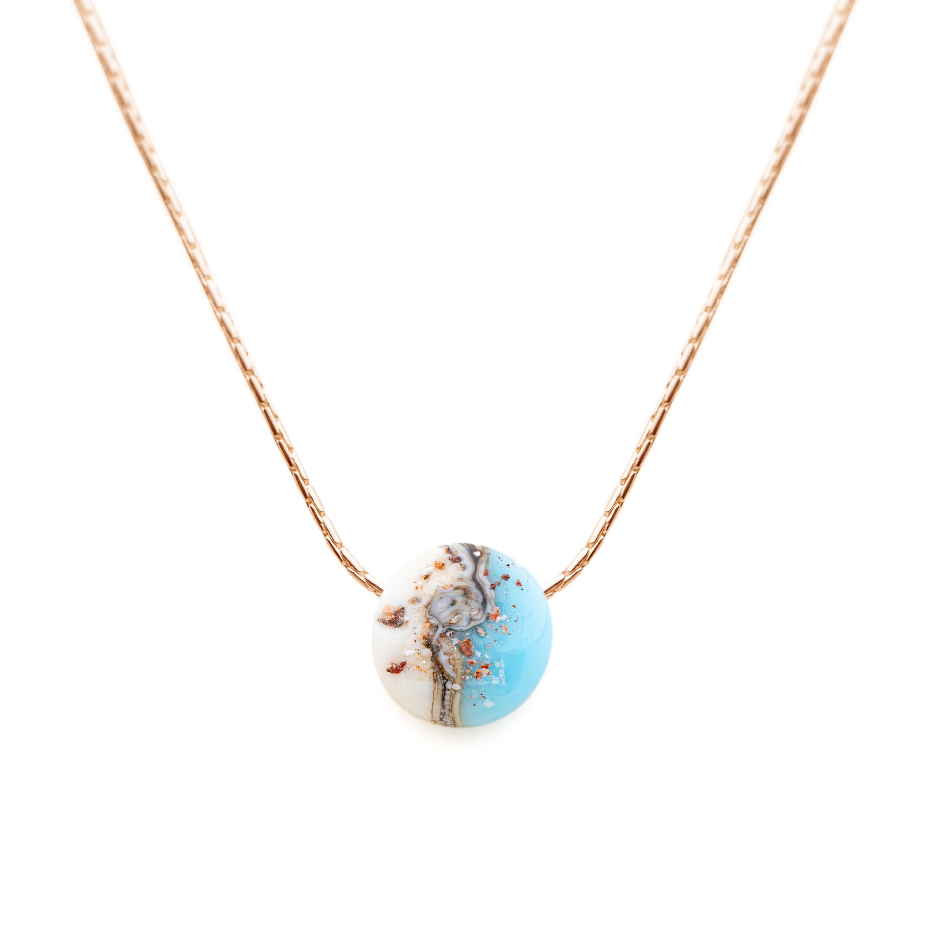 Necklace with a blue marbled pendant on a white background