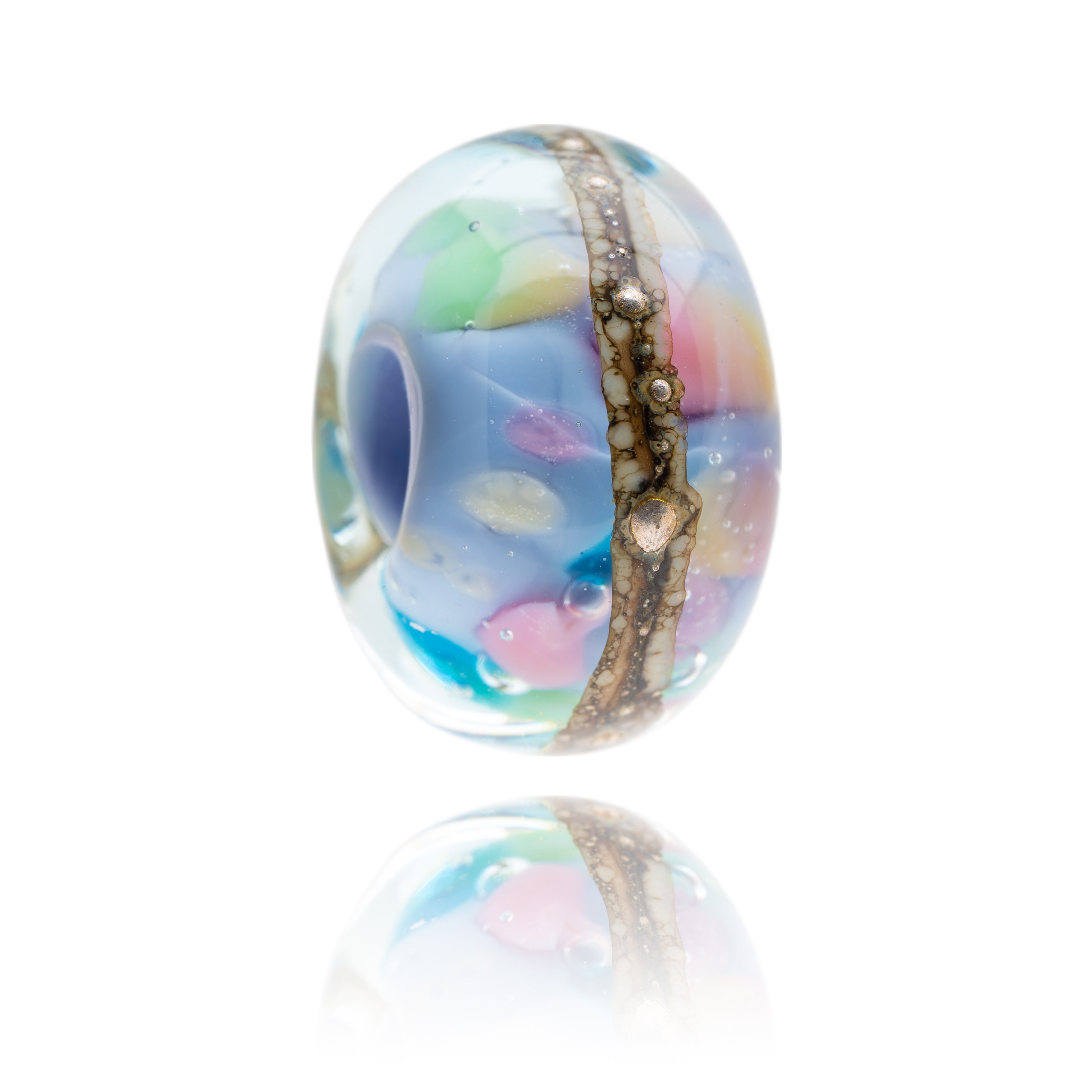Multicolour glass bead with silver decoration inspired by Aldeburgh in Suffolk.