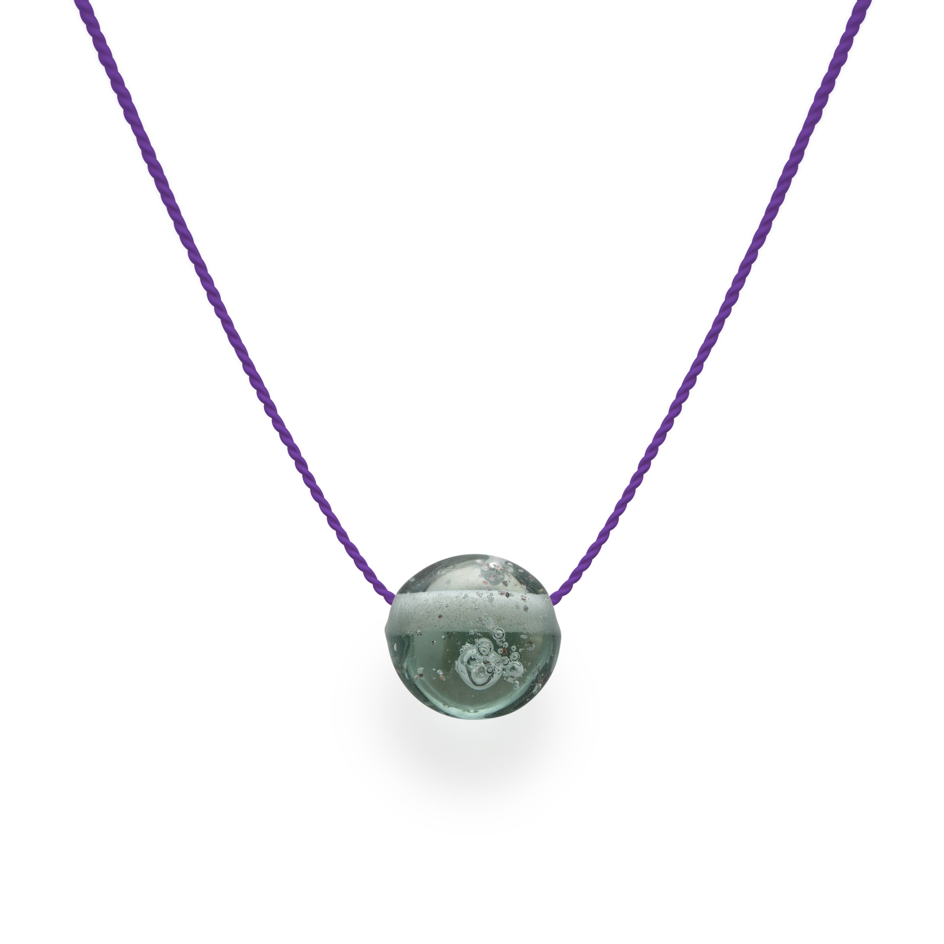 Grey sand pebble necklace with grains of sand from North Devon beaches melted into the glass.