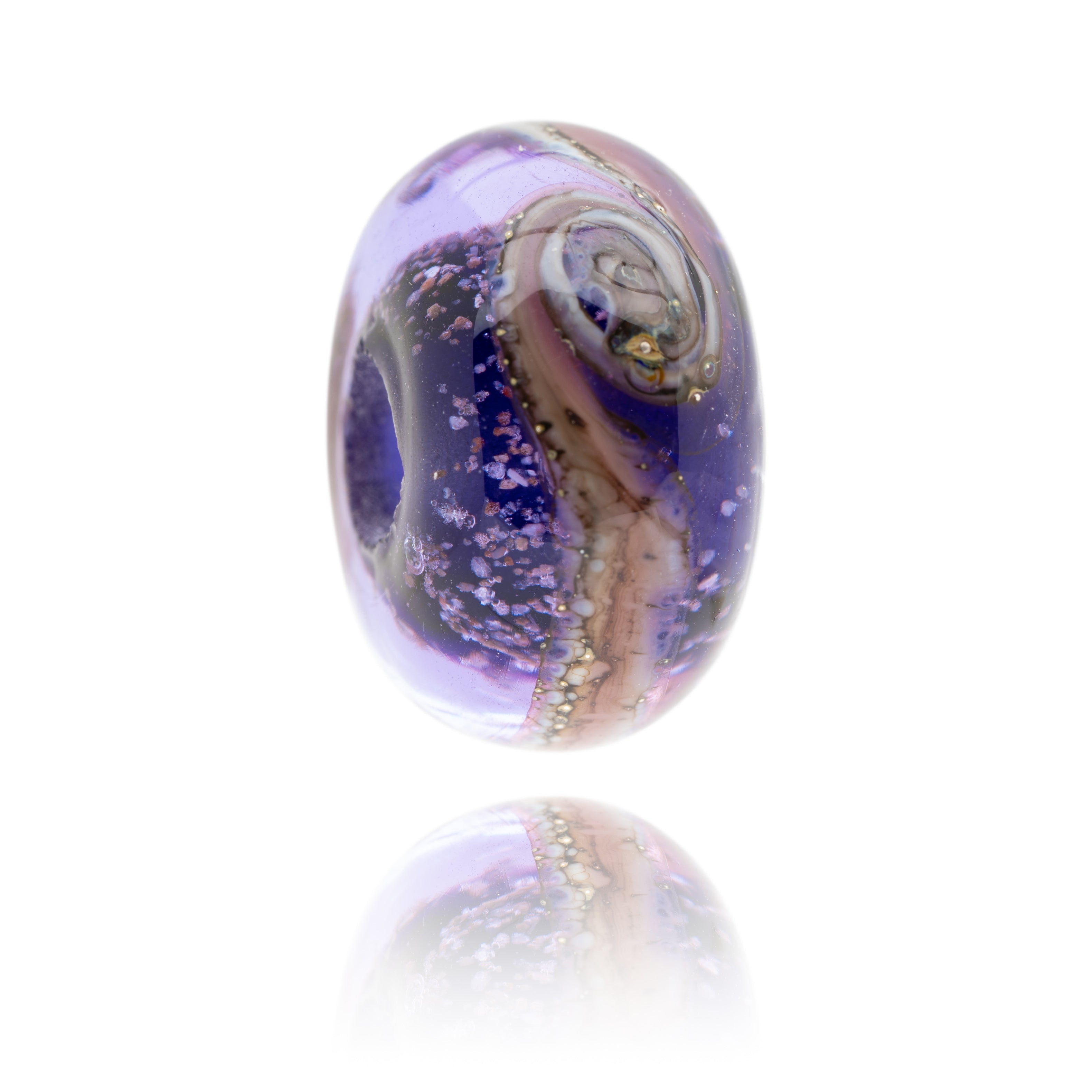 Purple glass bead with sand in the glass made for the mental health awareness charity, Ask For Jake in Braunton, North Devon.