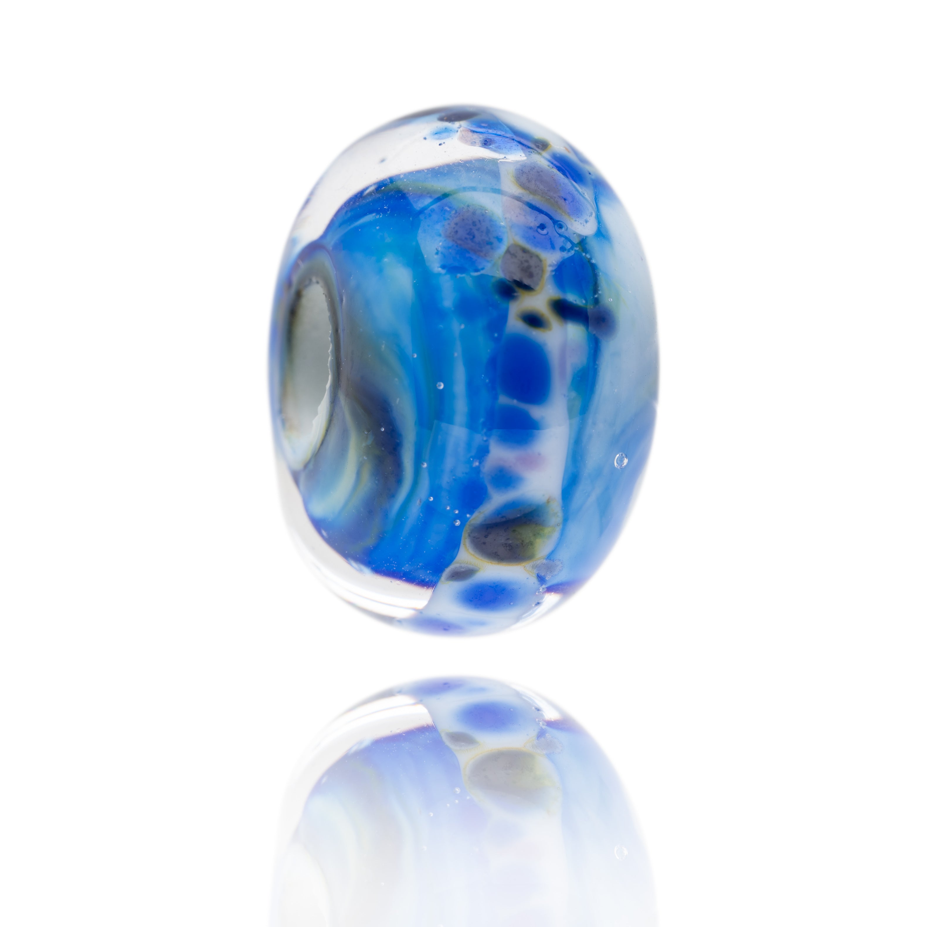 Swirling blue glass bead made with Murano glass representing Aviemore in Scotland.