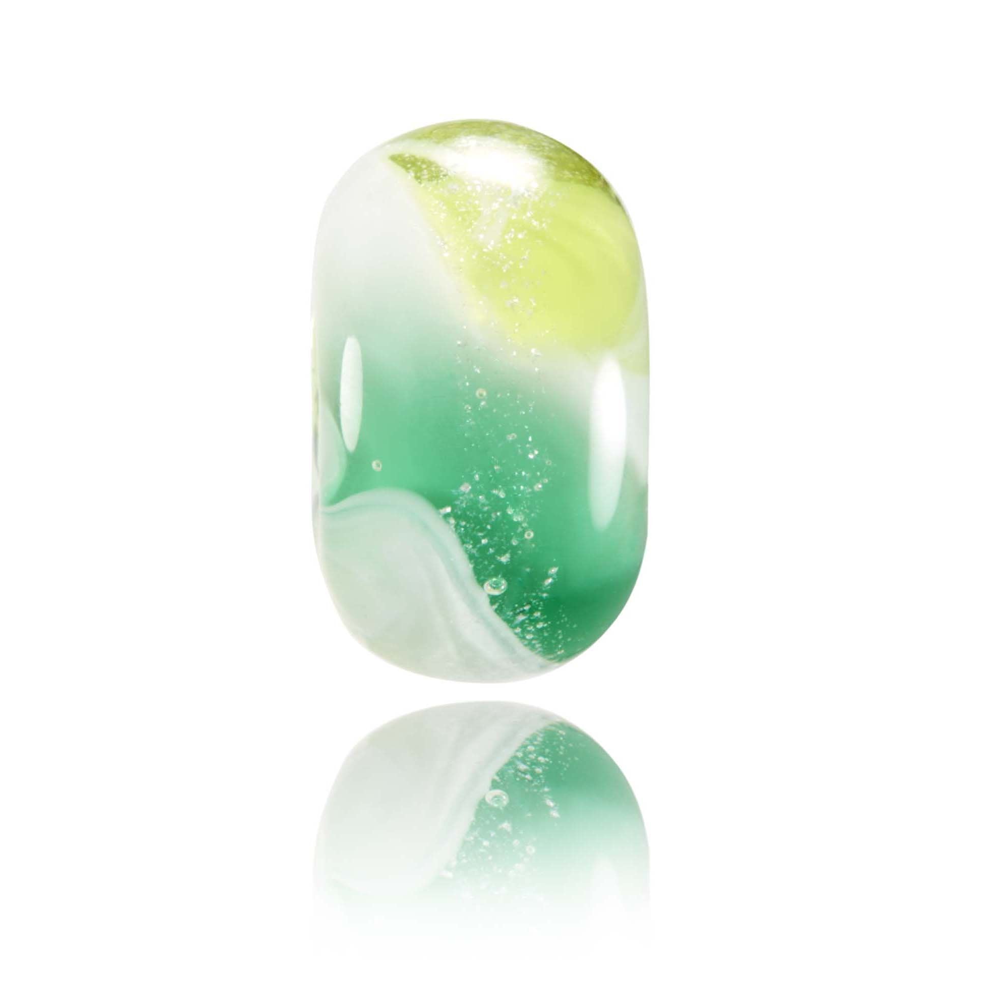 Green, yellow and white swirling shimmering glass bead representing Pipeline Surf Spot on the North Shore Hawaii.