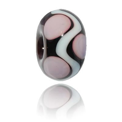 Dark purple glass bead with a wavy white stripe and pink dots around the bead. Representing Oyster Reef break at Croyde Bay, North Devon.