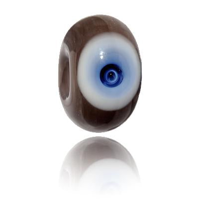 Dark grey glass bead with big white and blue bubble dot on surface for Holywell Bay in Cornwall.