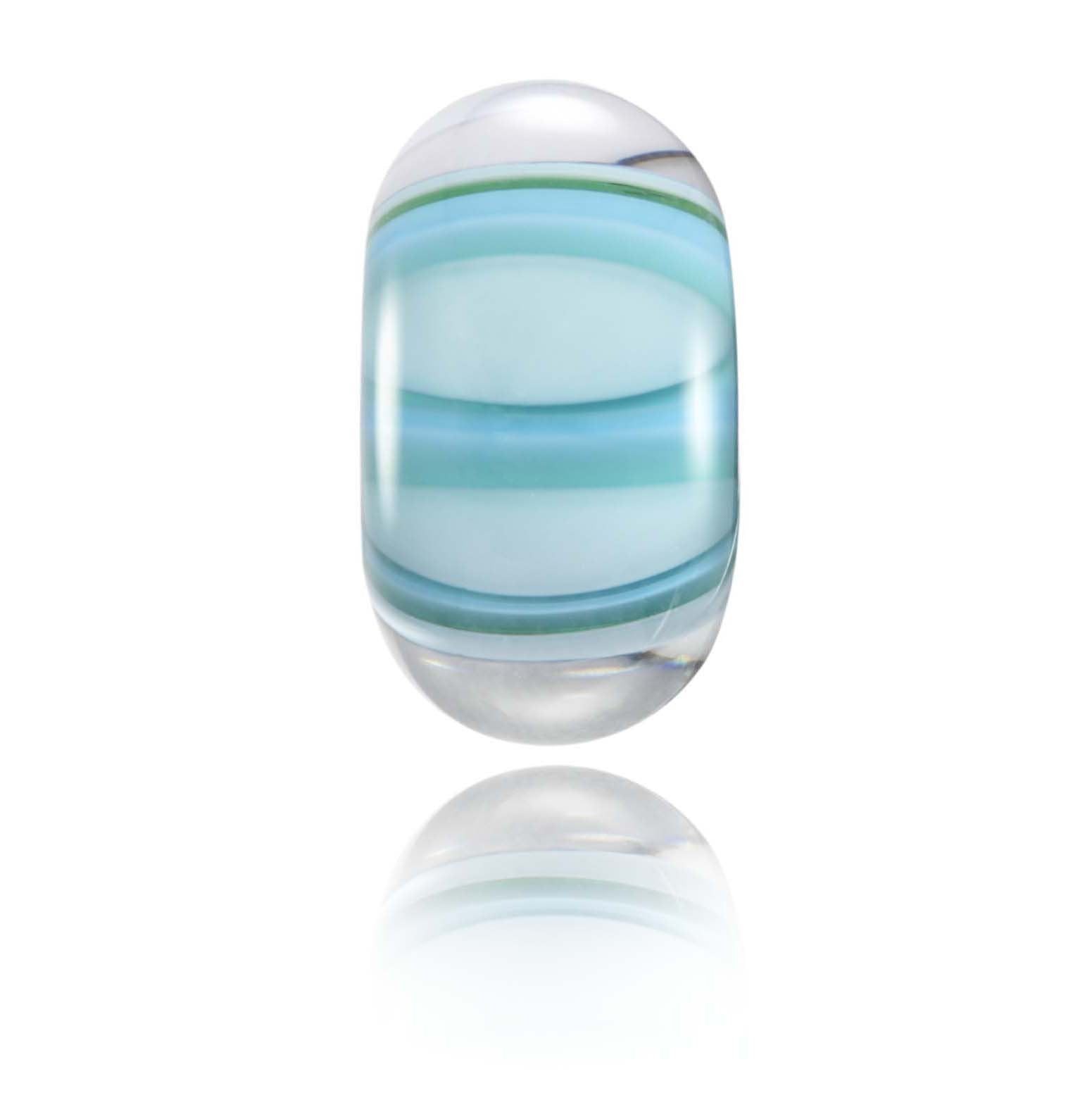 Turquoise, green and clear striped glass bead representing Porthtowan beach in Cornwall, UK.