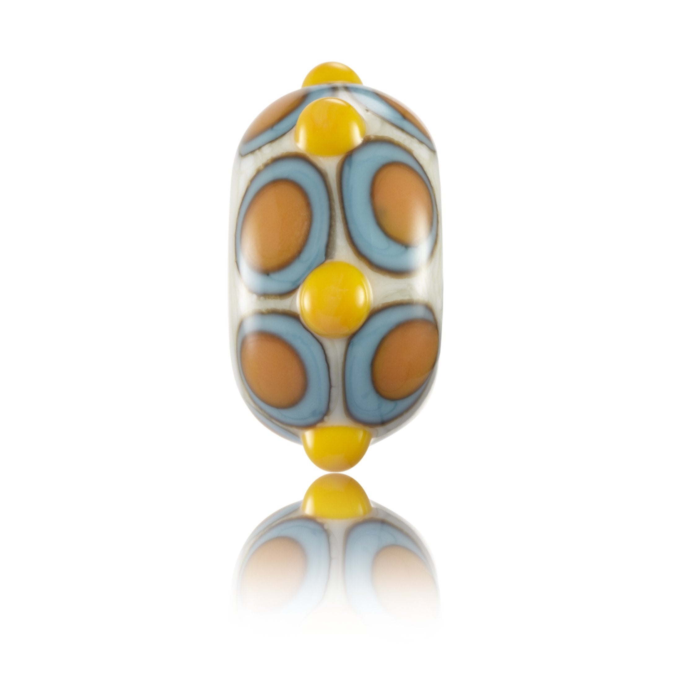 Cream with yellow and orange dot patterns Murano glass lamp work bead representing Byron Bay in Australia