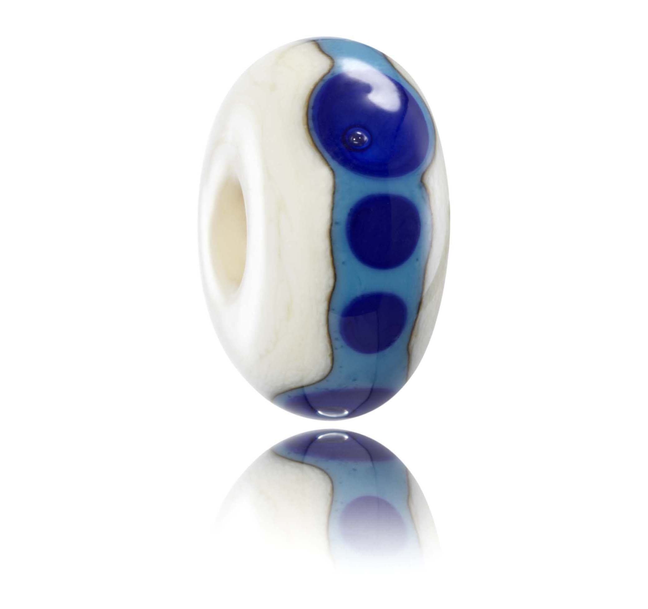 Cream, blue and turquoise glass bead with dot patterns around the middle, representing Praa Sands Beach In West Cornwall, UK.