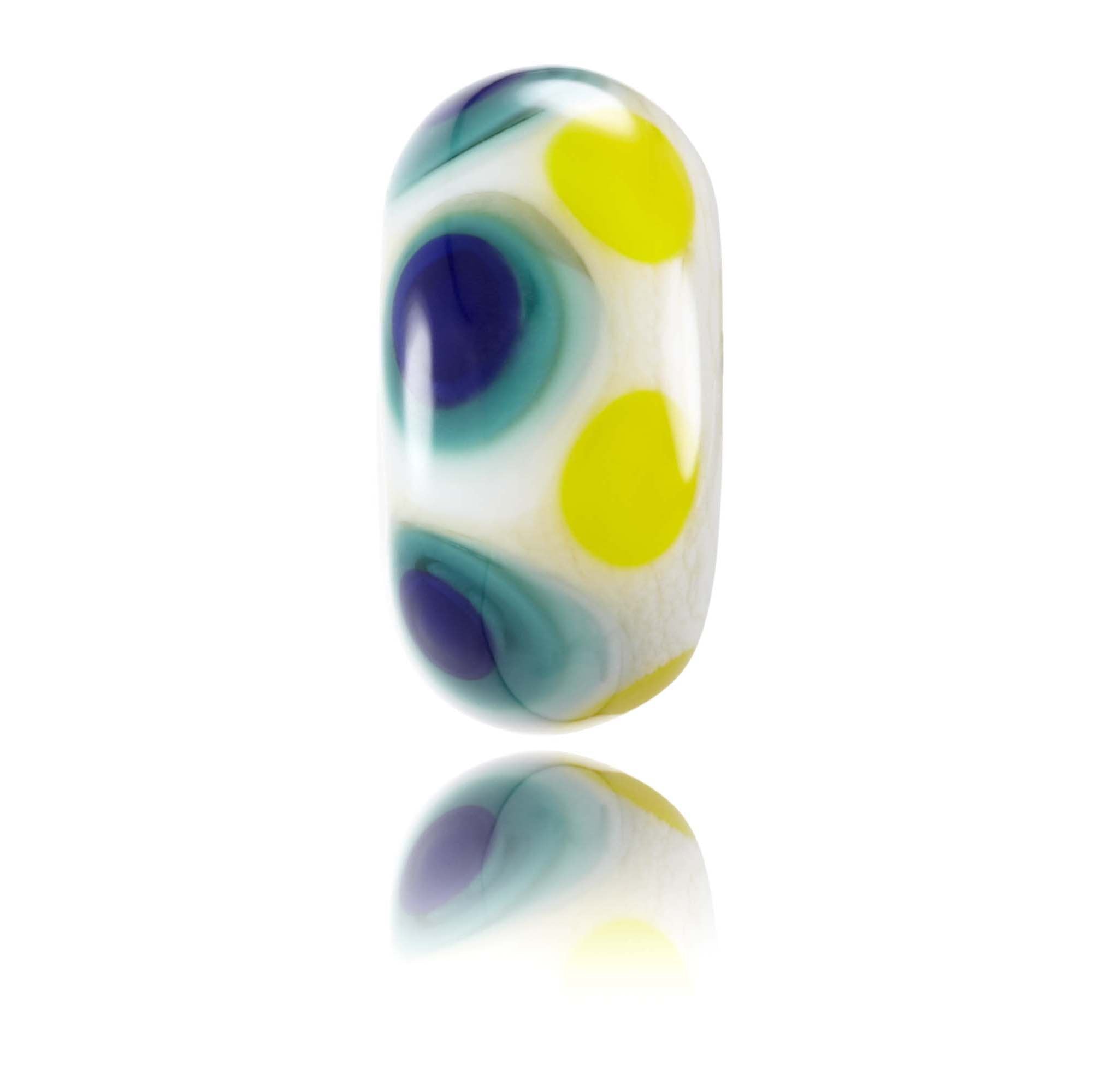 Cream, yellow, blue and green spotted glass bead representing Bondi Beach In Australia. Front.