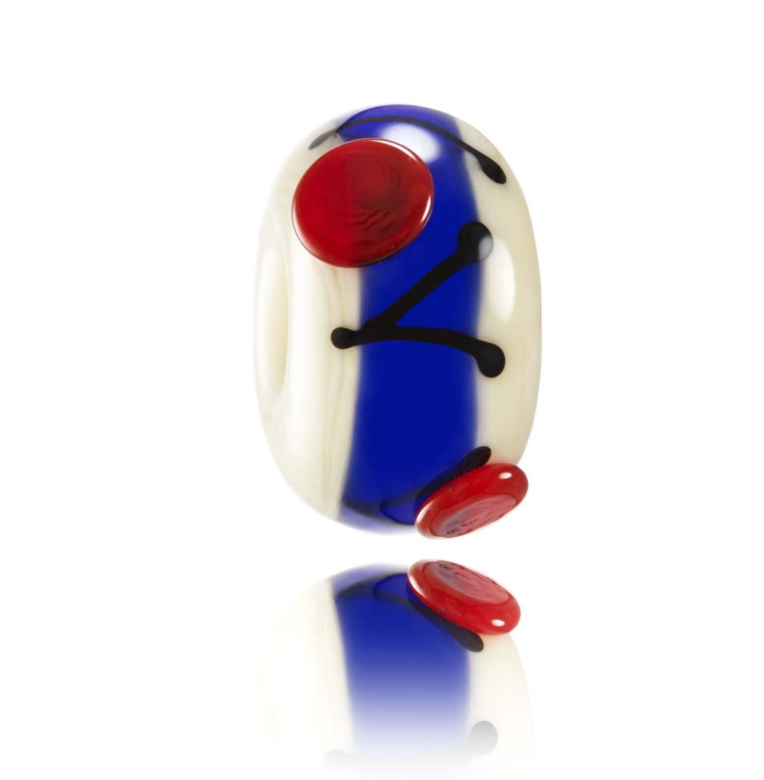 Cream glass bead with a blue stripe around the middle and red dots and black stripes patterns. Representing the Philippines in Asia.