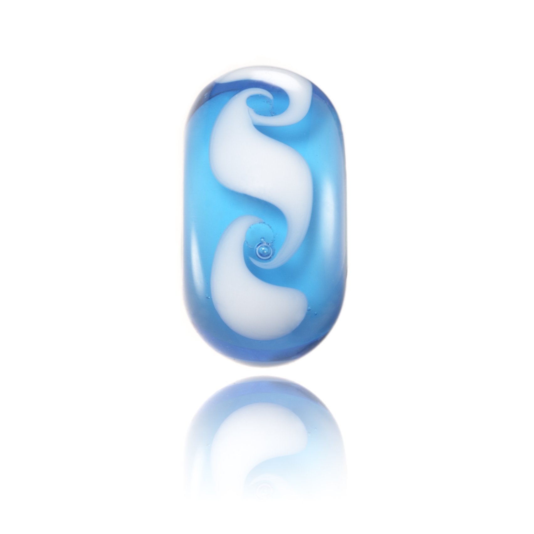 Blue and white lamp work glass bead representing Bells Beach in Australia.