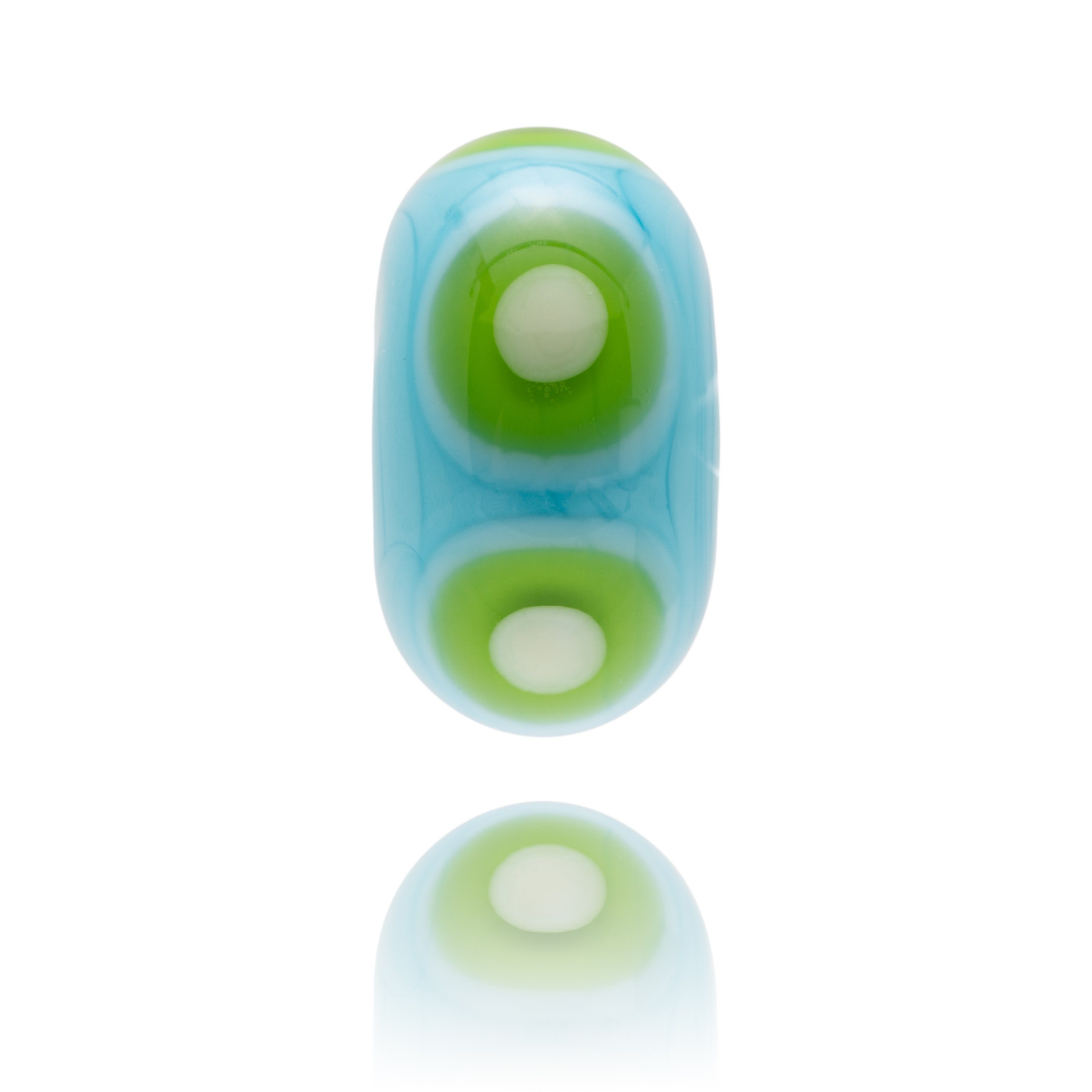 Turquoise and green glass bead with dot patterns representing Bantham Bay In Devon