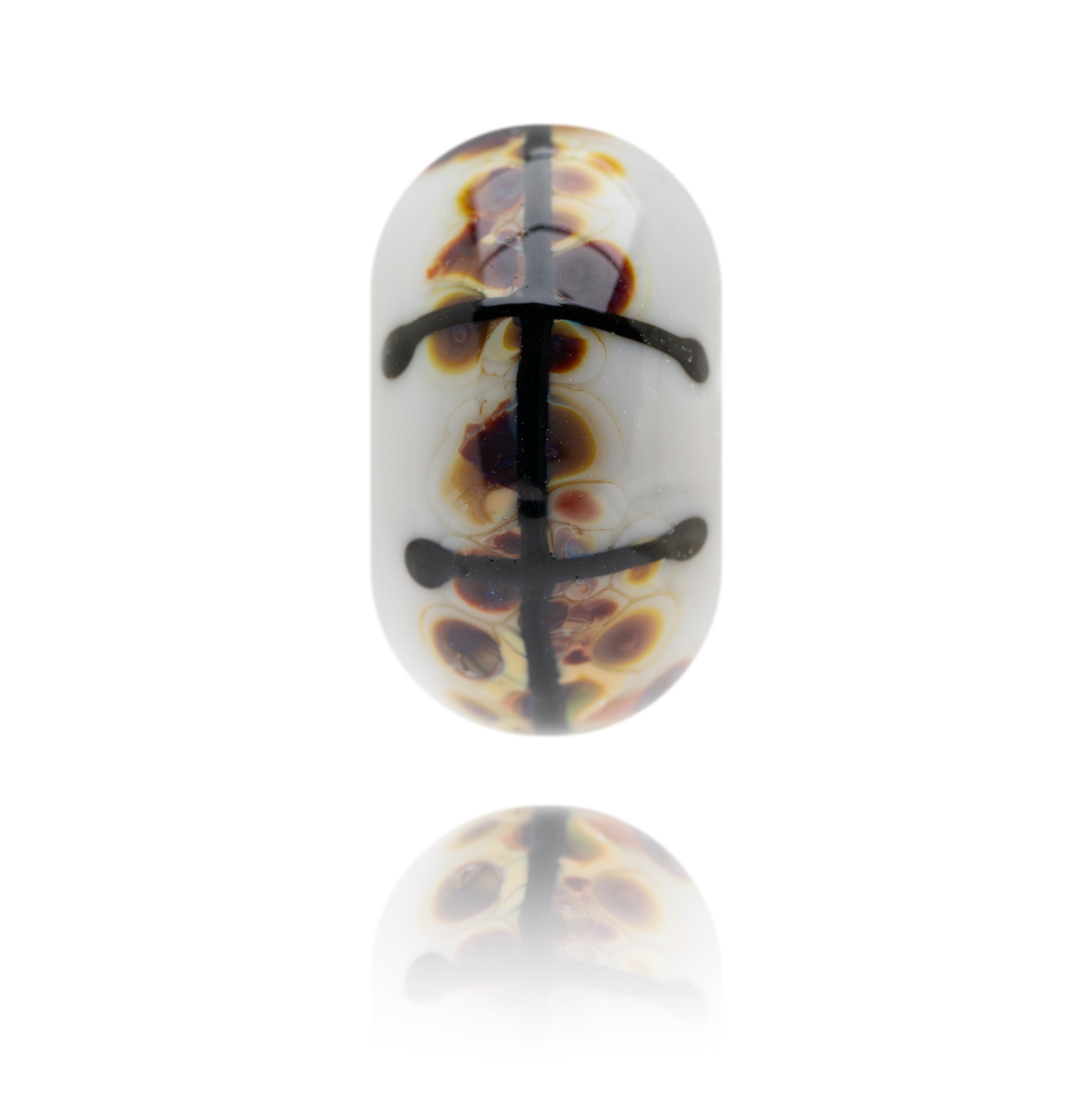 Grey glass bead with black and brown speckled pattern on surface. Representing Bridlington in Yorkshire.