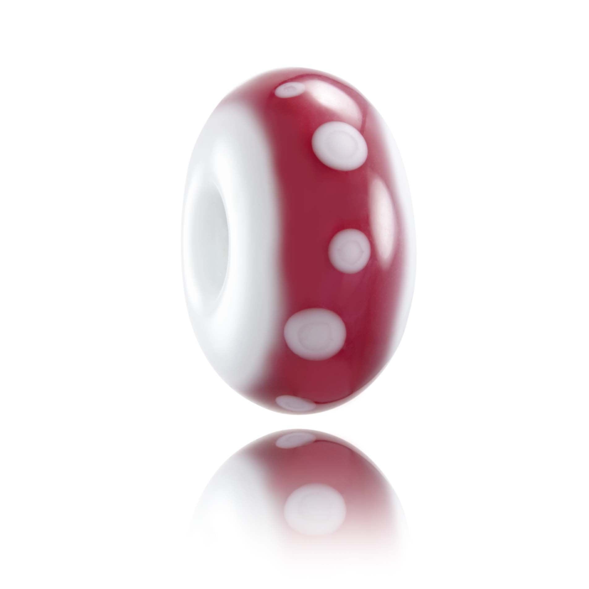 Pink and white Murano glass bead representing Cervinia in Italy.