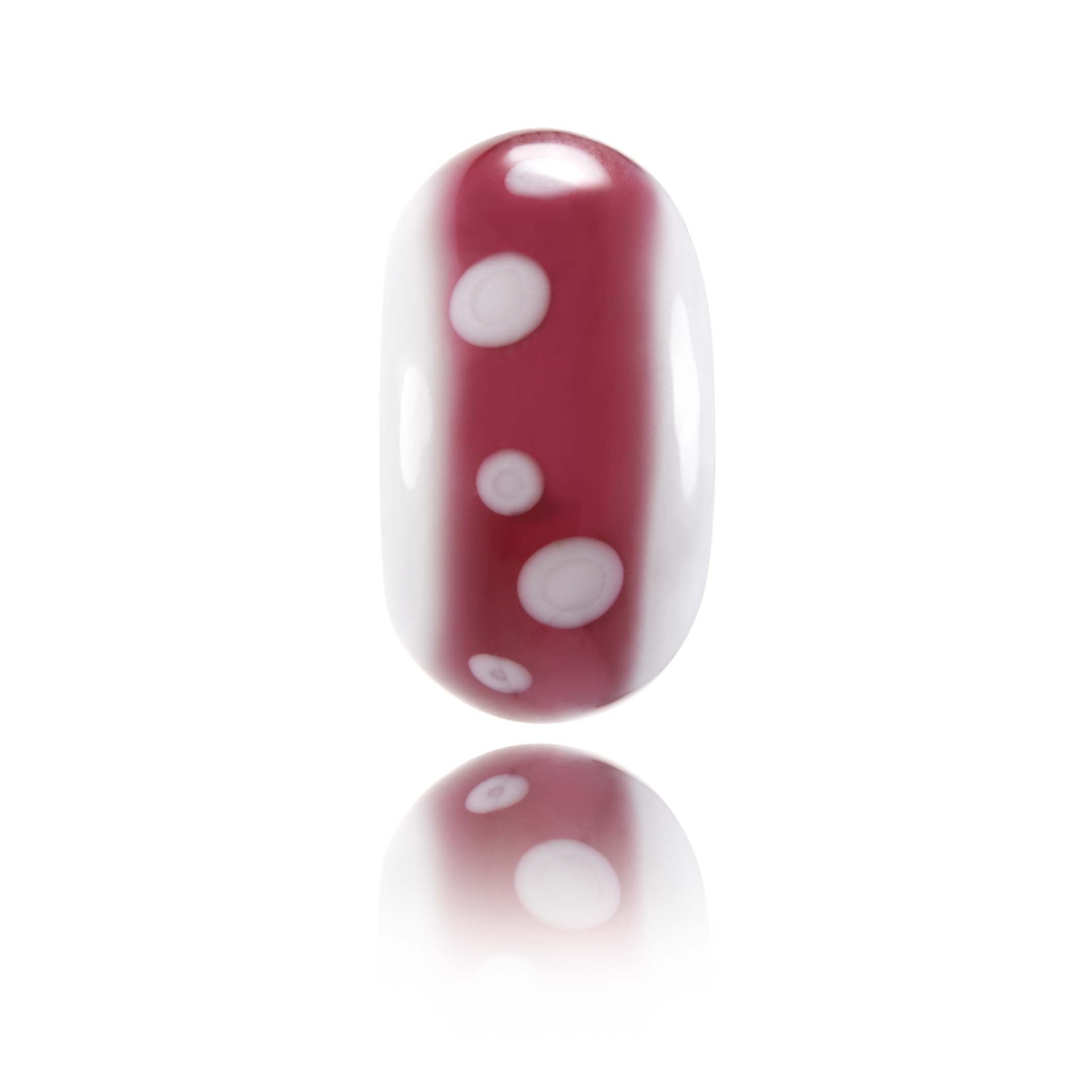 Pink and white Murano glass bead representing Cervinia in Italy.