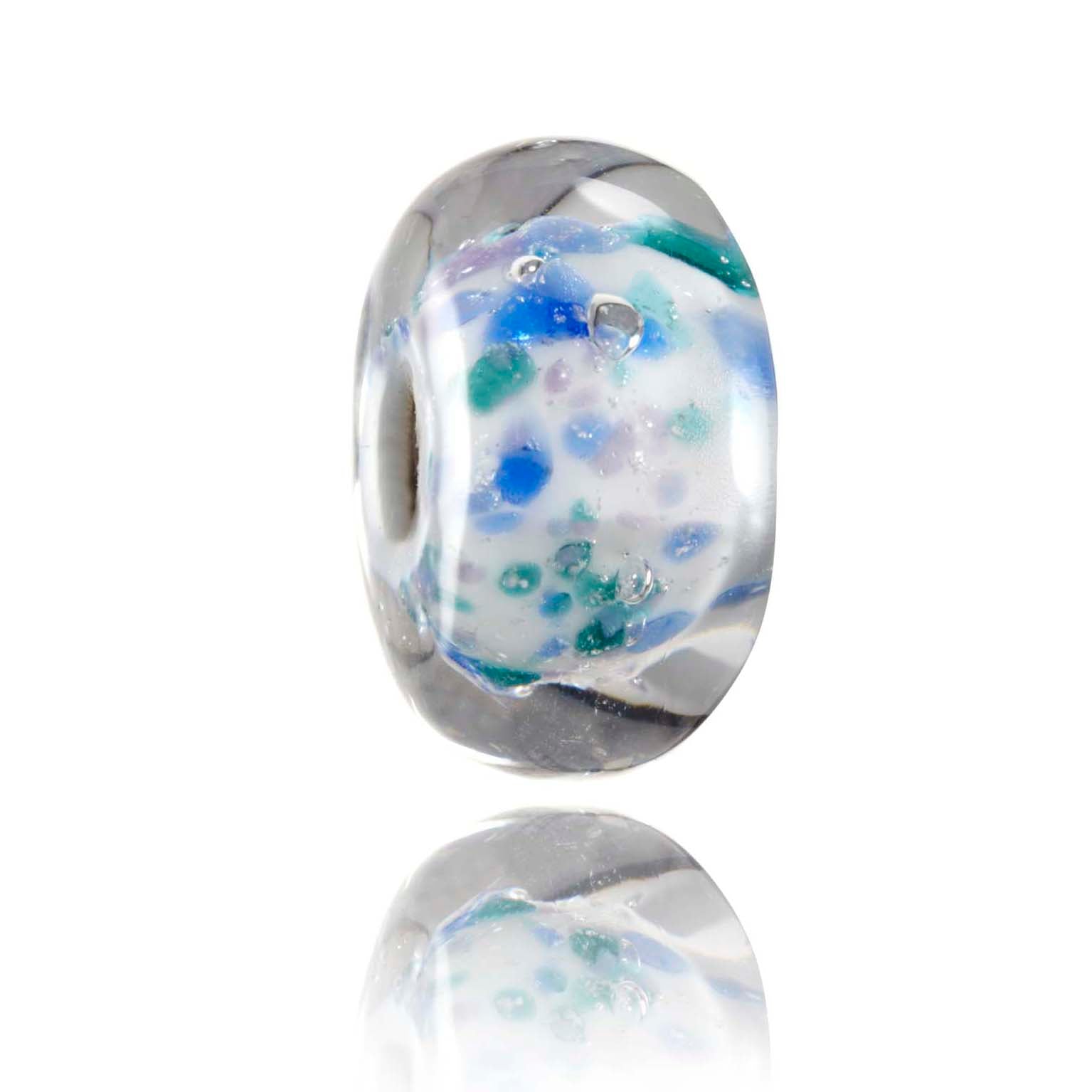 White glass bead with green, blue, purple speckles and sparkle for Chapel Porth beach in Cornwall.