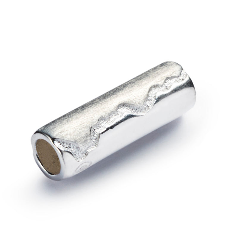 Silver tube shaped bead with the  Cornish Coastline county engraved on the surface.