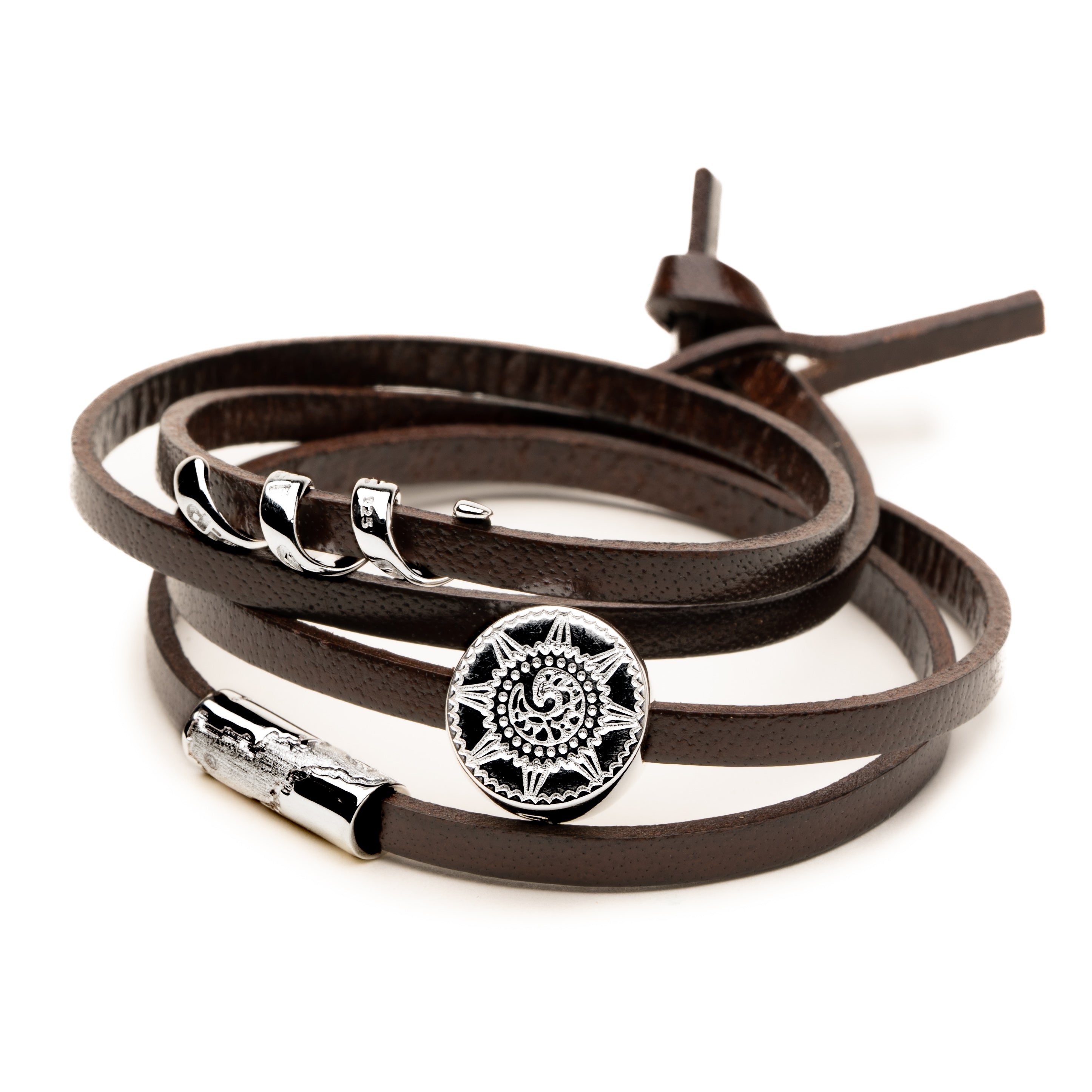 Brown leather bracelet with silver Cornish charms.