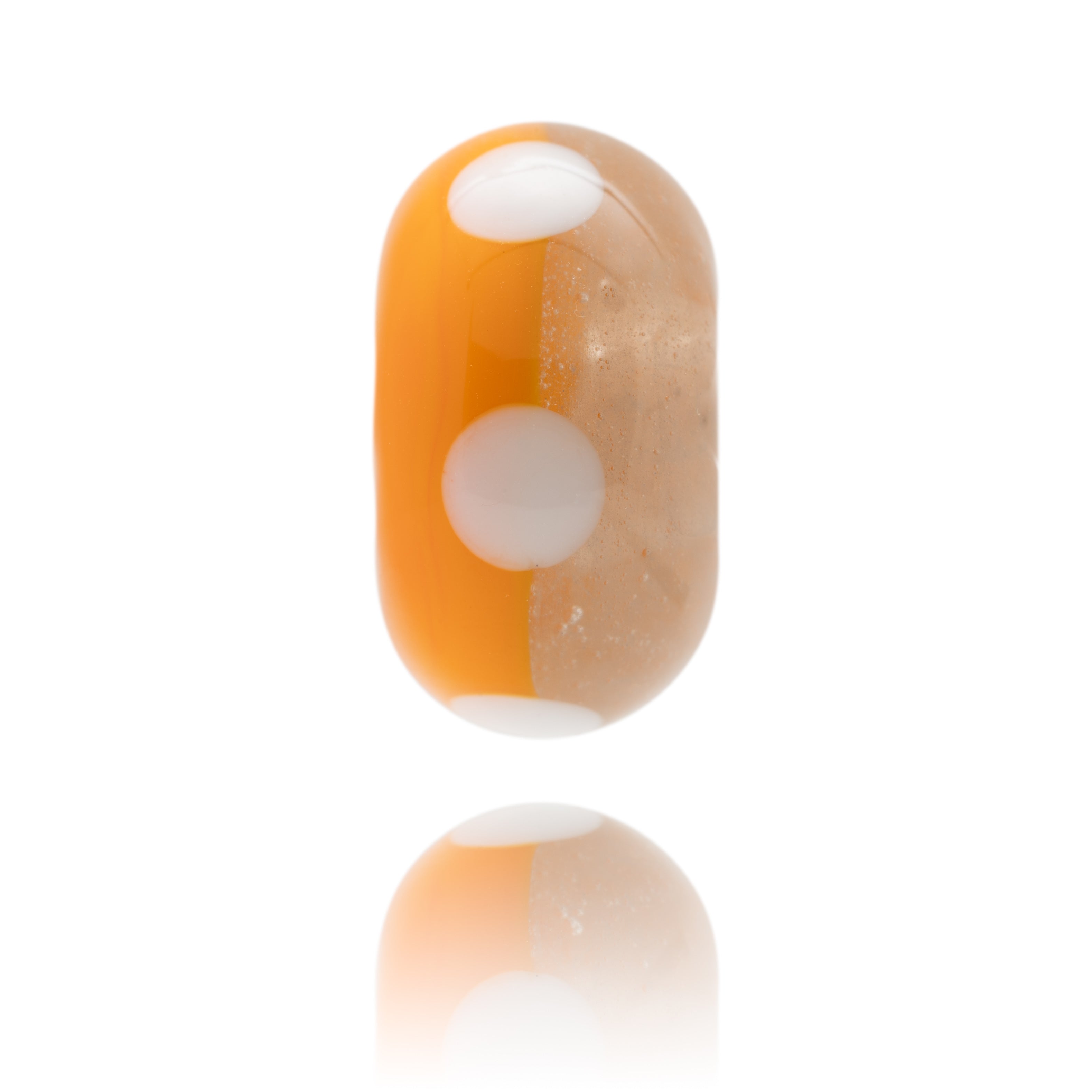 Orange and white spotted glass lamp work baed for Camber Sands In Kent.