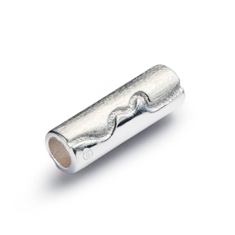Silver tube shaped bead with the North Devon Coastline county engraved on the surface.